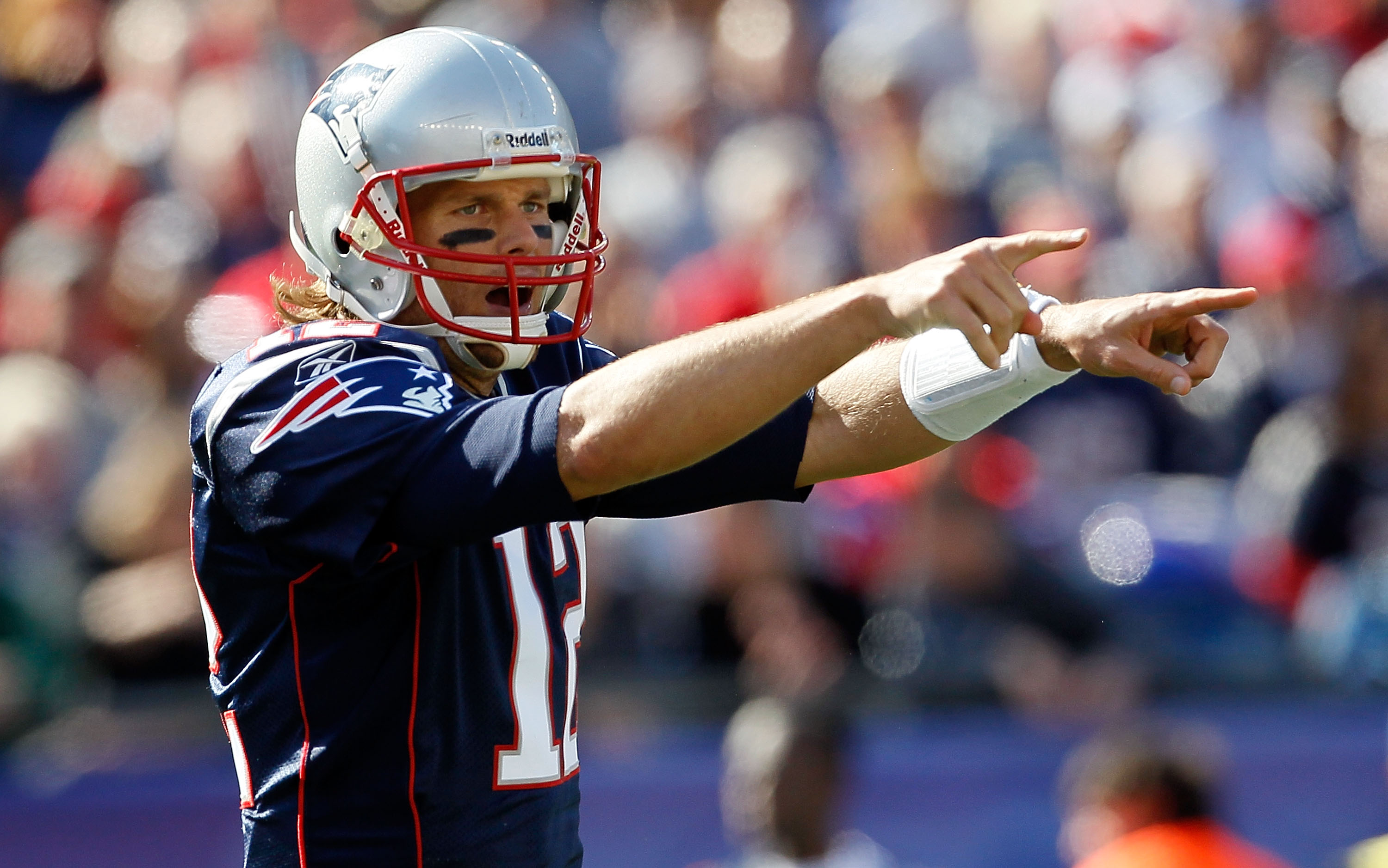 FOXBORO, MA - OCTOBER 17:  Tom Brady #12 of the New England Patriots gestures during a game against the Baltimore Ravens at Gillette Stadium on October 17, 2010 in Foxboro, Massachusetts. (Photo by Jim Rogash/Getty Images)