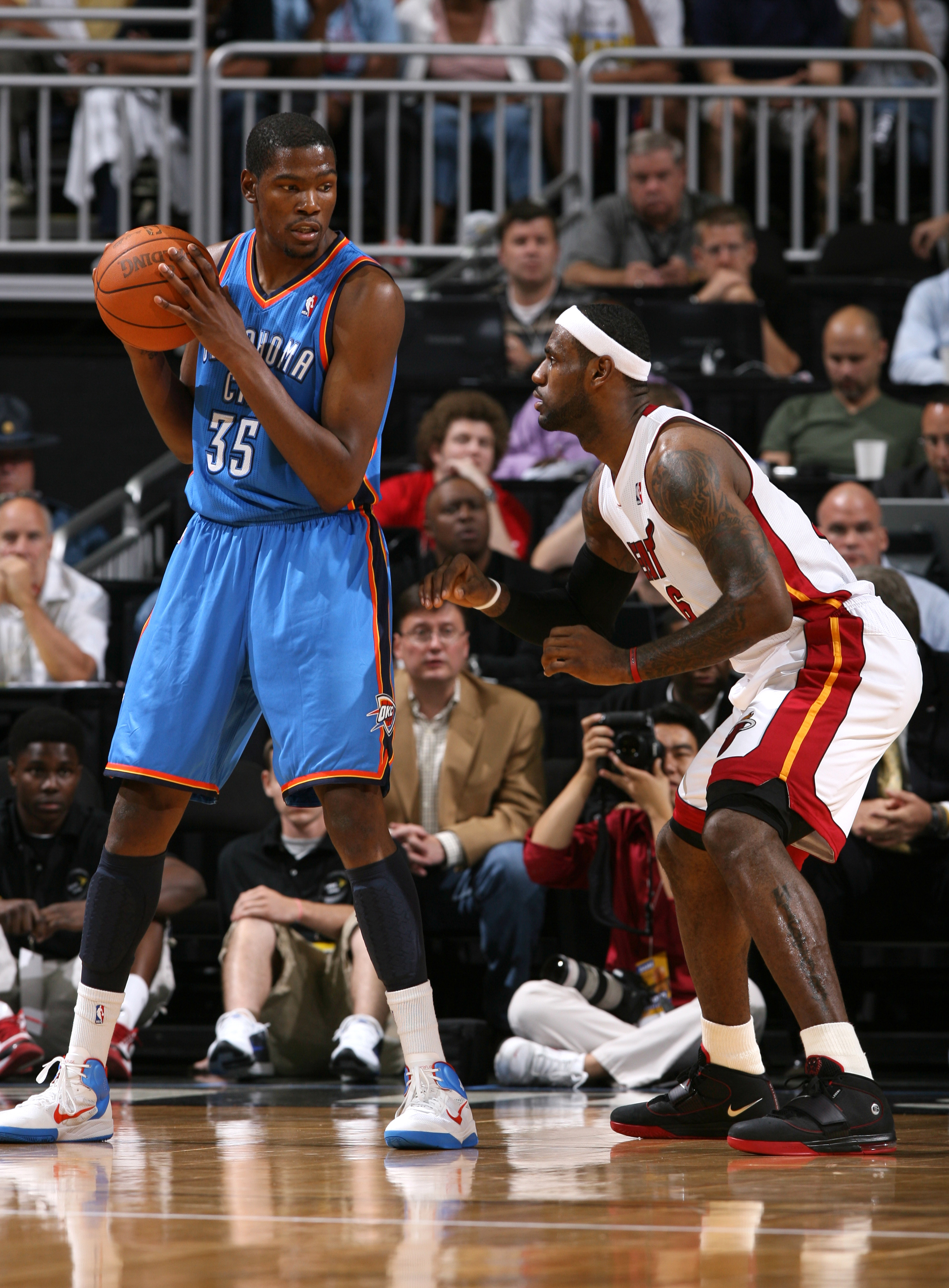 KANSAS CITY, MO - OCTOBER 8: Kevin Durant #35 of the Oklahoma City Thunder looks to drive past LeBron James #6 of the Miami Heat before the game on October 8, 2010 at the Sprint Center in Kansas City, Missouri. NOTE TO USER: User expressly acknowledges a