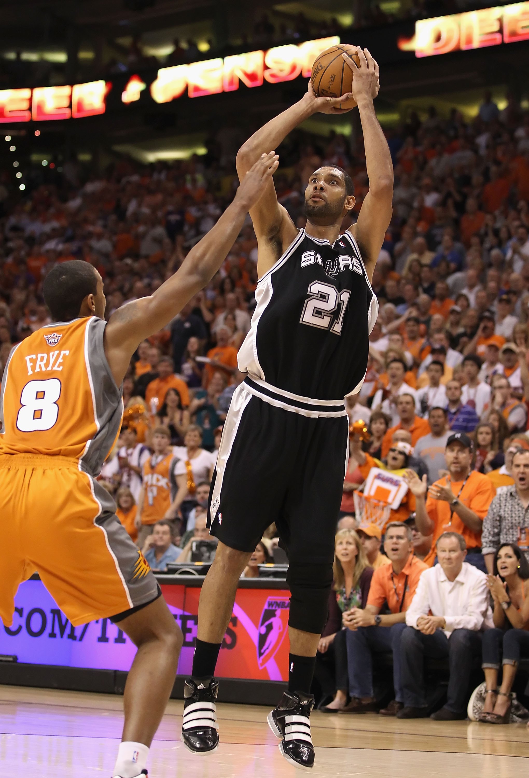 PHOENIX - MAY 05: Tim Duncan #21 of the San Antonio Spurs shoots the ball during Game Two of the Western Conference Semifinals of the 2010 NBA Playoffs against the Phoenix Suns at US Airways Center on May 5, 2010 in Phoenix, Arizona. The team is wearing
