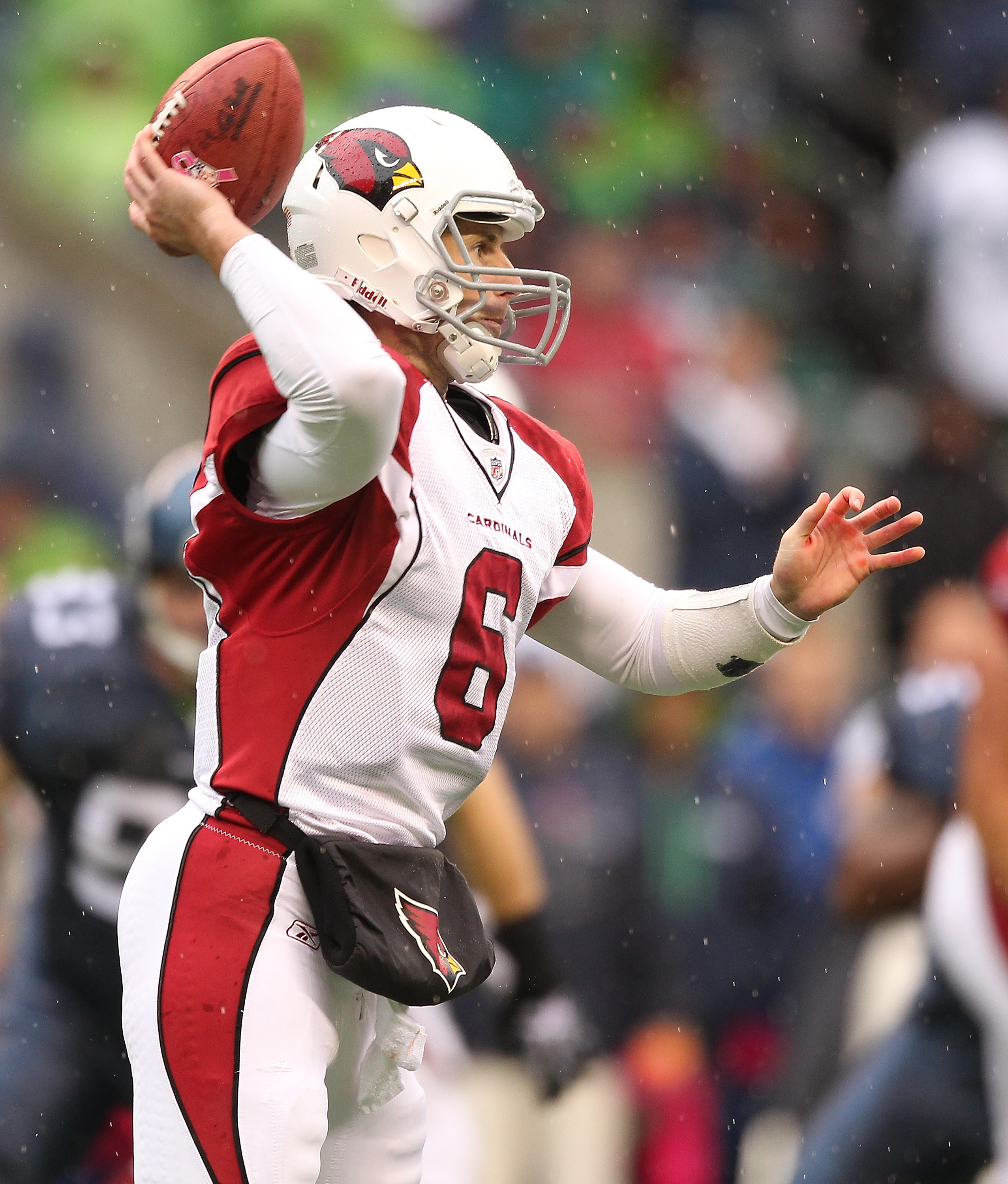 Arizona Cardinals wide receiver Larry Fitzgerald walks off the field after  turning the ball over on downs in their game against the Seattle Seahawks  on Sunday October 24, 2010 at Qwest Field