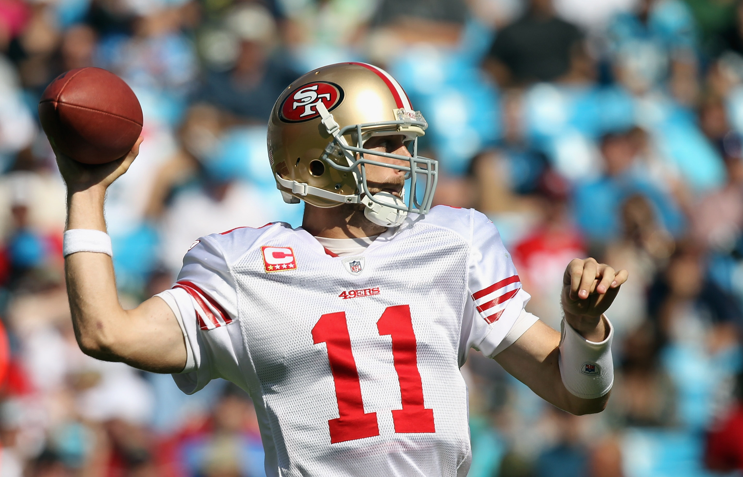 WR Ted Ginn, #19 49ers, runs with the ball during the NFL