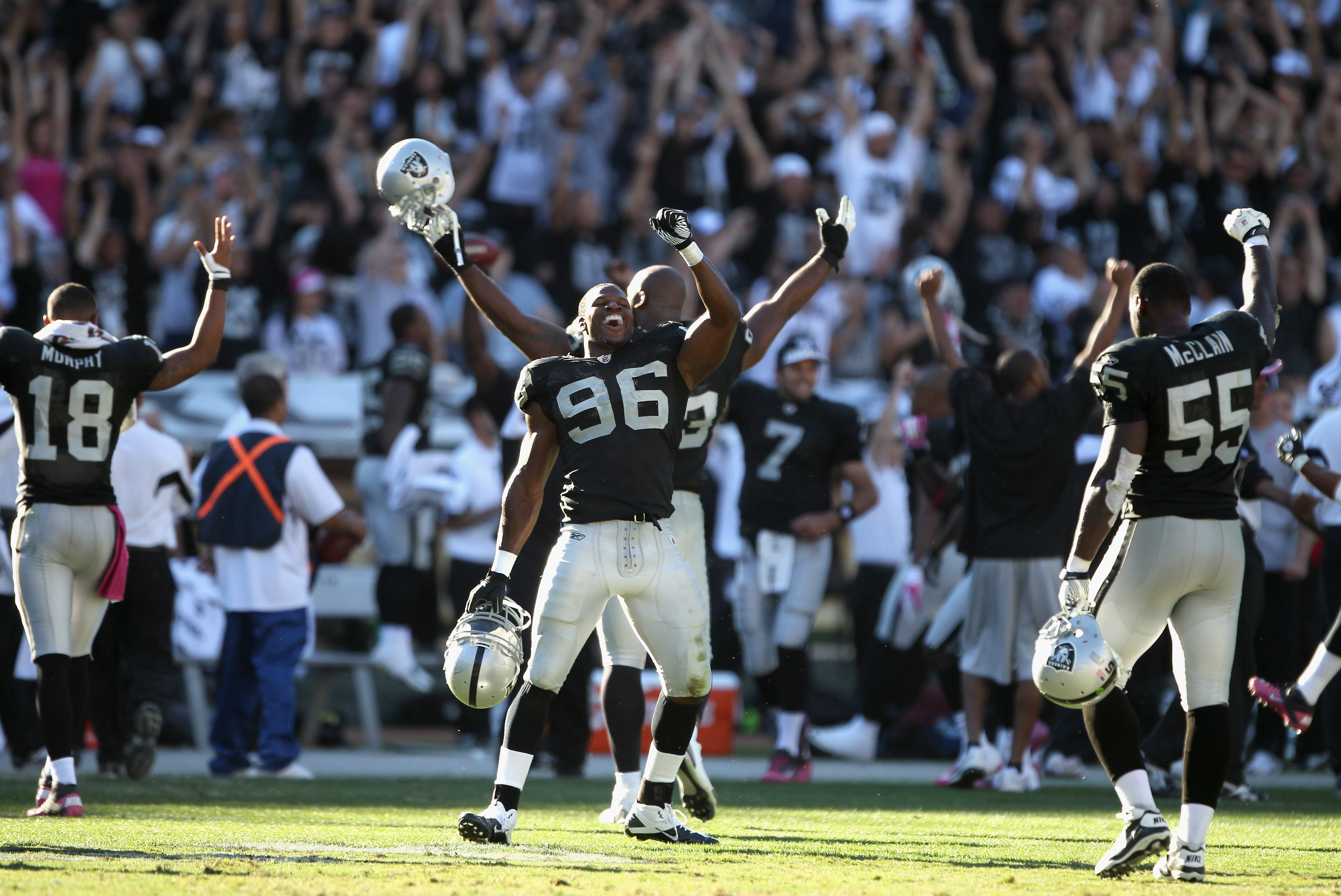 24 October 2010: Oakland Raiders running back Darren McFadden (20) runs  with the ball. The Oakland Raiders defeated the Denver Broncos by a score  of 59 to 14 at Invesco Field at