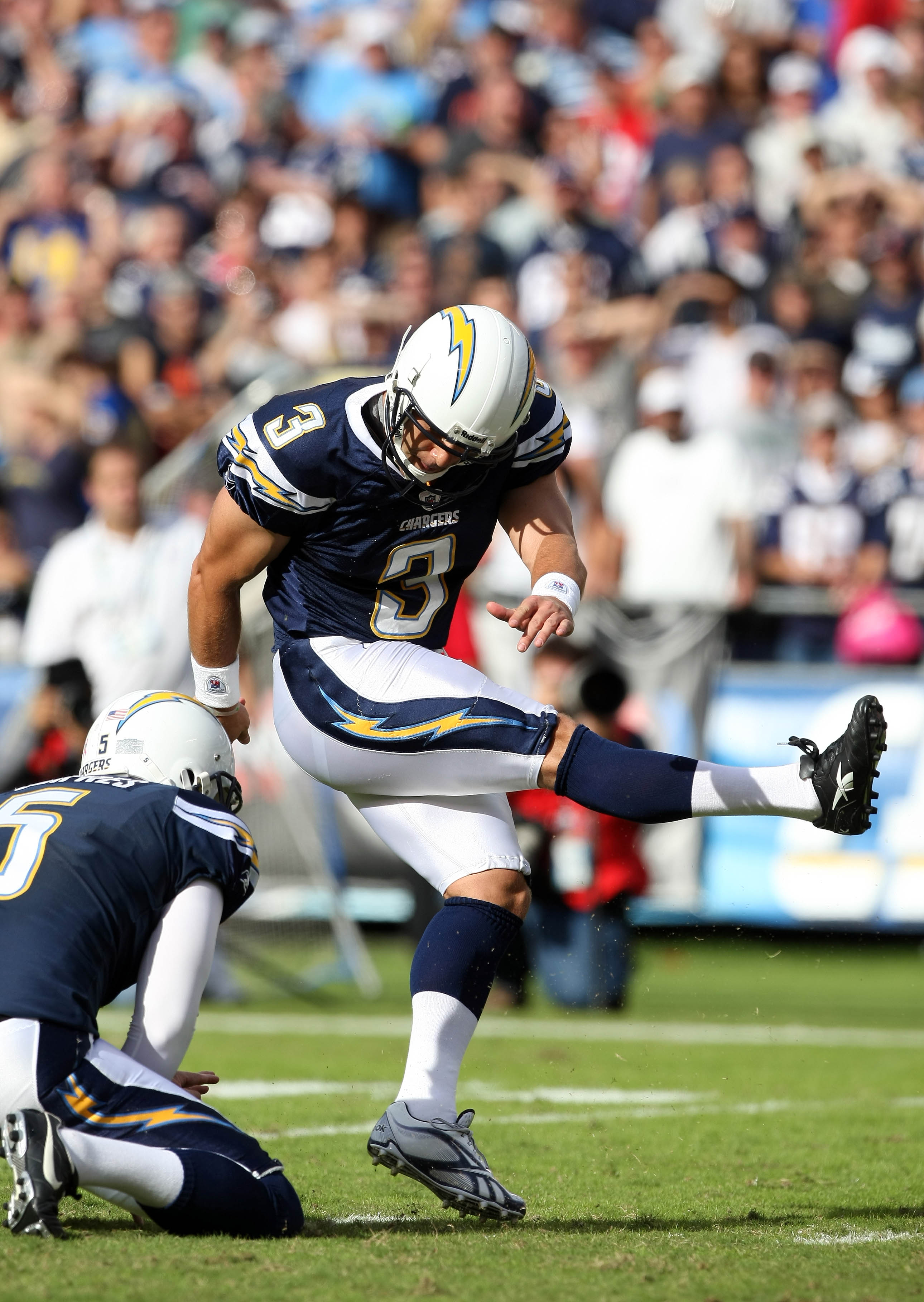 New England Patriots safety Sergio Brown (31) charges up field after  intercepting a pass intended for San Diego Chargers tight end Antonio Gates  (85) in the third quarter at Gillette Stadium in