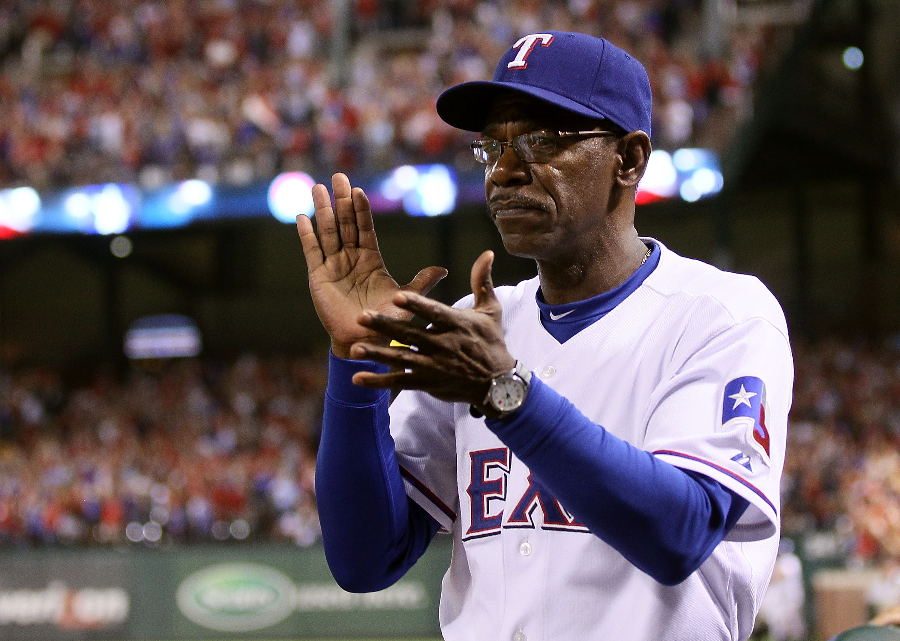 ARLINGTON, TX - OCTOBER 22:  Manager Ron Washington of the Texas Rangers claps during Game Six of the ALCS against the New York Yankees during the 2010 MLB Playoffs at Rangers Ballpark in Arlington on October 22, 2010 in Arlington, Texas.  (Photo by Elsa/