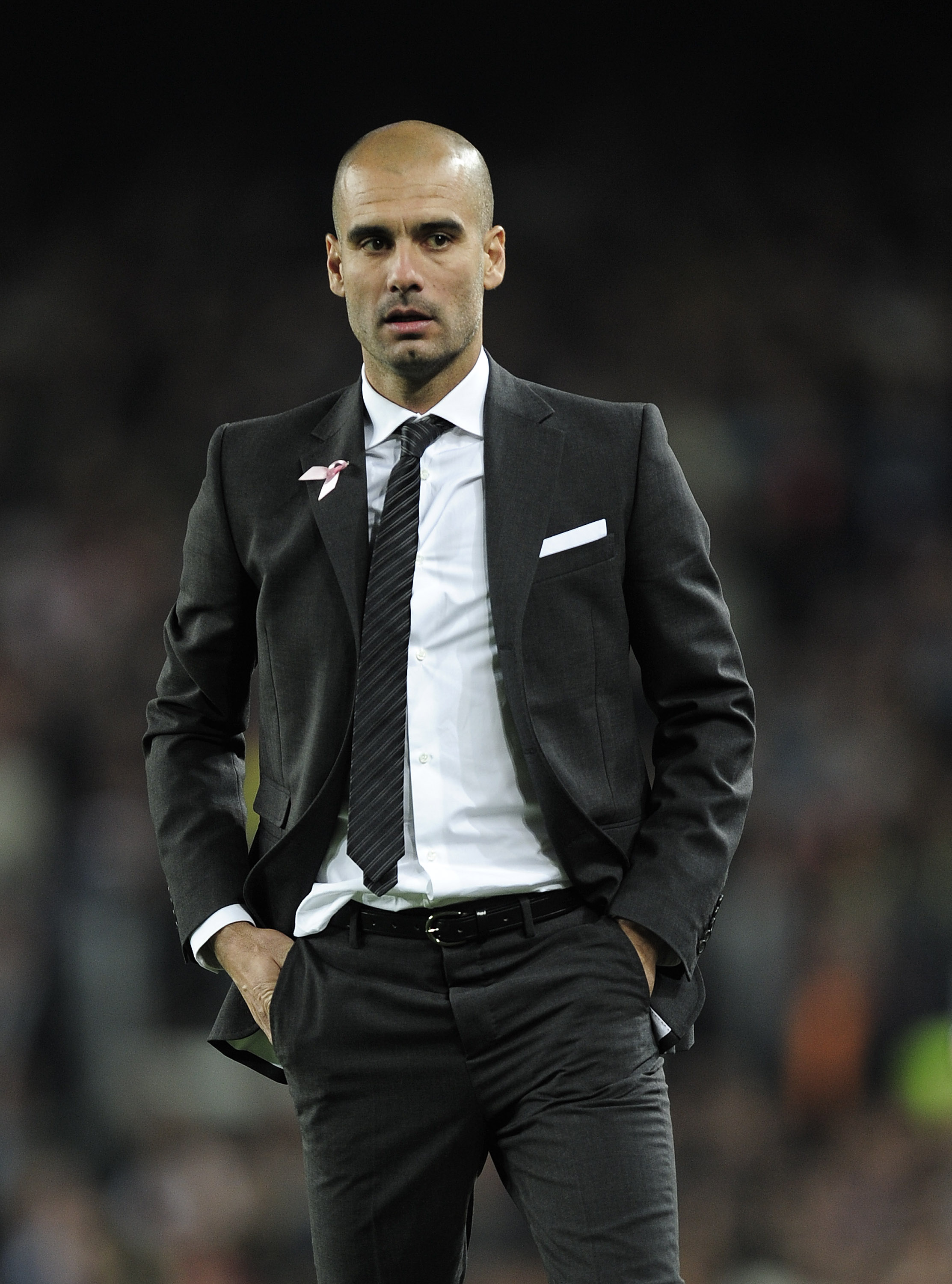 BARCELONA, SPAIN - OCTOBER 16:  Head coach Josep Guardiola of Barcelona looks on during the La Liga match between Barcelona and Valencia at the Camp Nou stadium on October 16, 2010 in Barcelona, Spain.  (Photo by David Ramos/Getty Images)