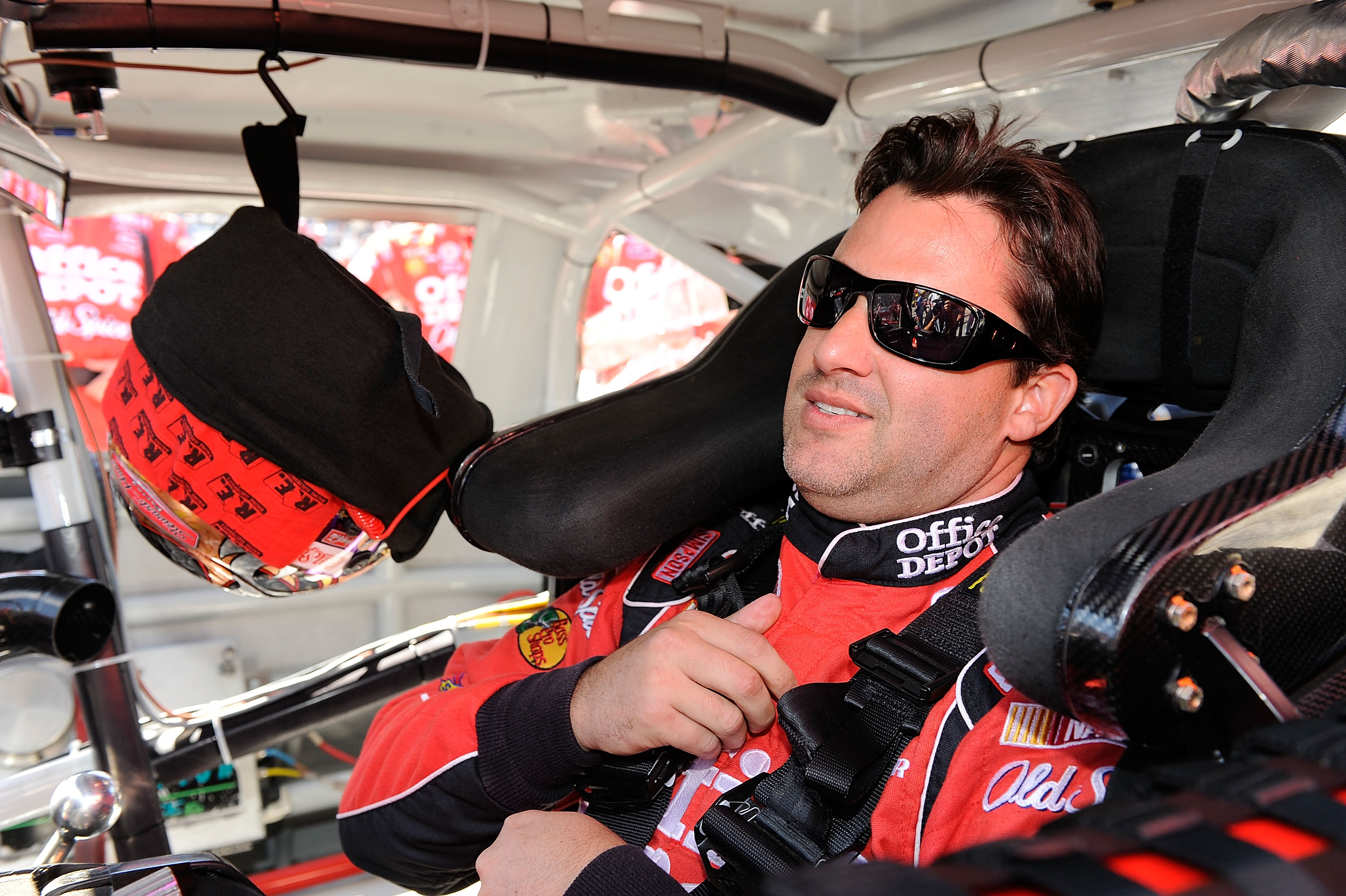 MARTINSVILLE, VA - OCTOBER 24:  Tony Stewart, driver of the #14 Old Spice/Office Depot Chevrolet, sits in his car prior to the start of the NASCAR Sprint Cup Series TUMS Fast Relief 500 at Martinsville Speedway on October 24, 2010 in Martinsville, Virgini