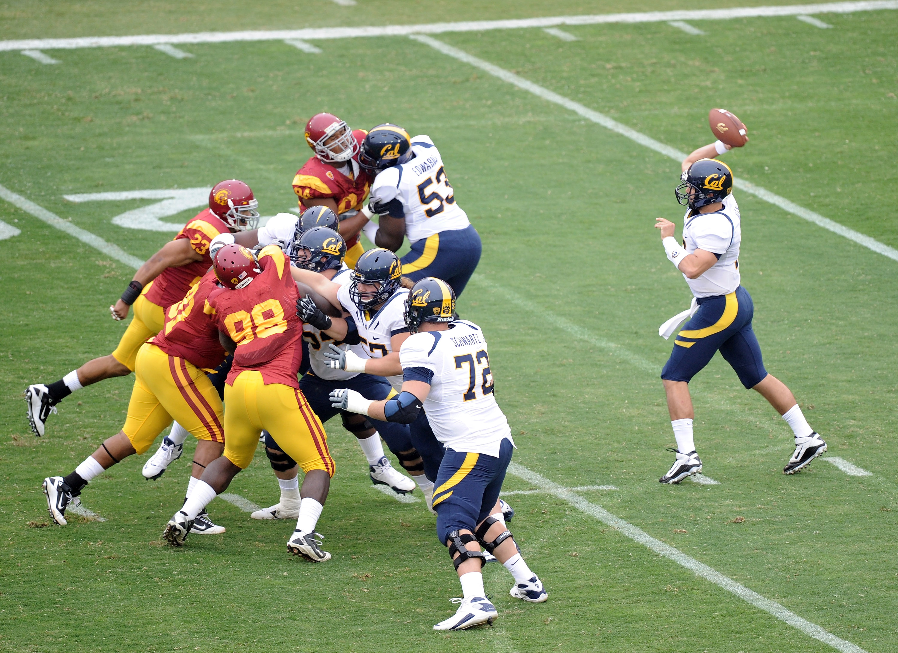 LOS ANGELES, CA - OCTOBER 16: Kevin Riley #13 of the California Golden Bears passes against the USC Trojans at Los Angeles Memorial Coliseum on October 16, 2010 in Los Angeles, California. (Photo by Harry How/Getty Images)