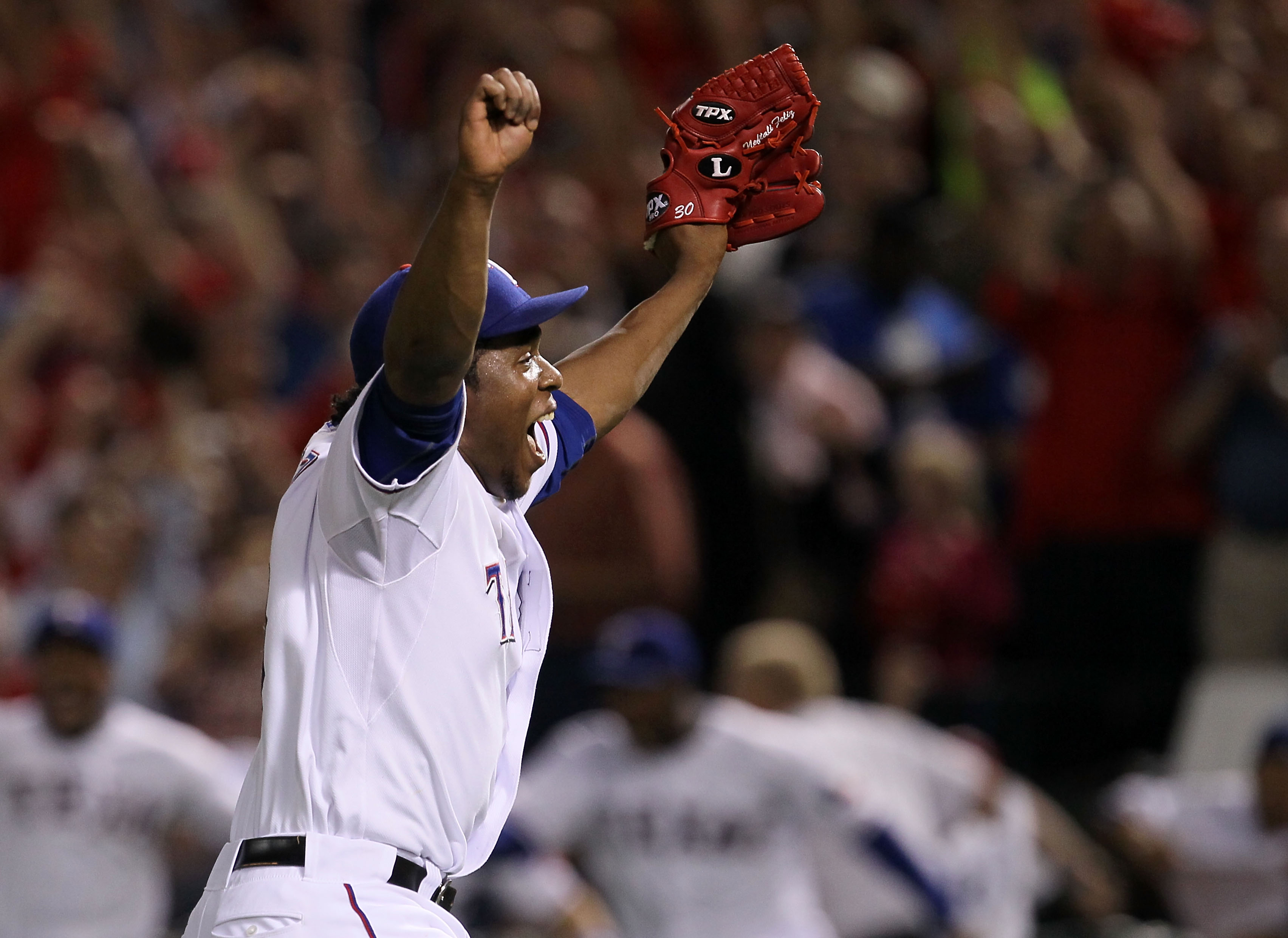 ARLINGTON, TX - OCTOBER 22:  Neftali Feliz #30 of the Texas Rangers celebrates after defeating the New York Yankees 6-1 in Game Six of the ALCS to advance to the World Series during the 2010 MLB Playoffs at Rangers Ballpark in Arlington on October 22, 201
