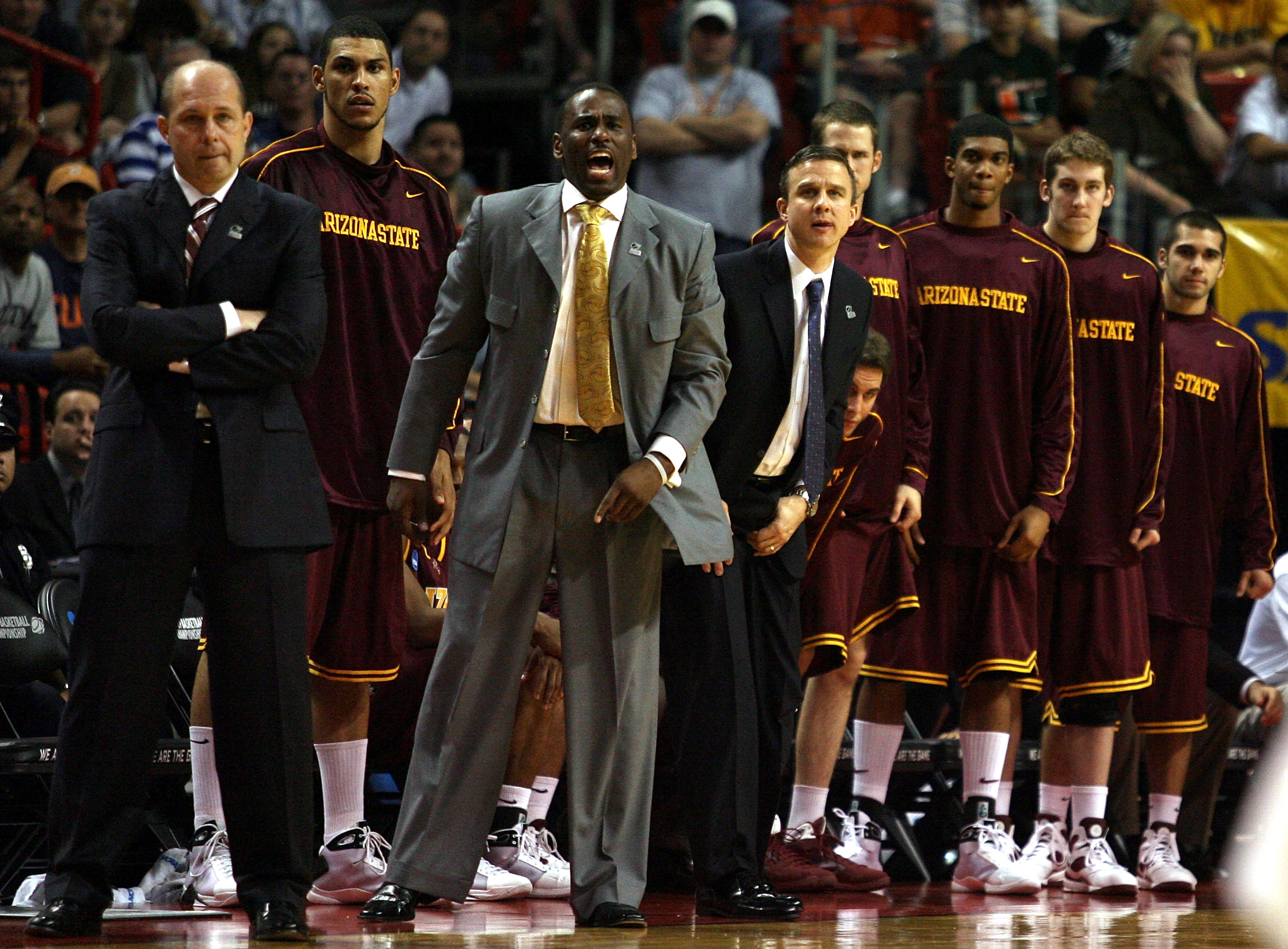 MIAMI - MARCH 22: Coach Herb Sendek (R) of the Arizona State Sun Devils looks down the court against the Syracuse Orange during the second round of the NCAA Division I Men's Basketball Tournament at the American Airlines Arena on March 22, 2009 in Miami,