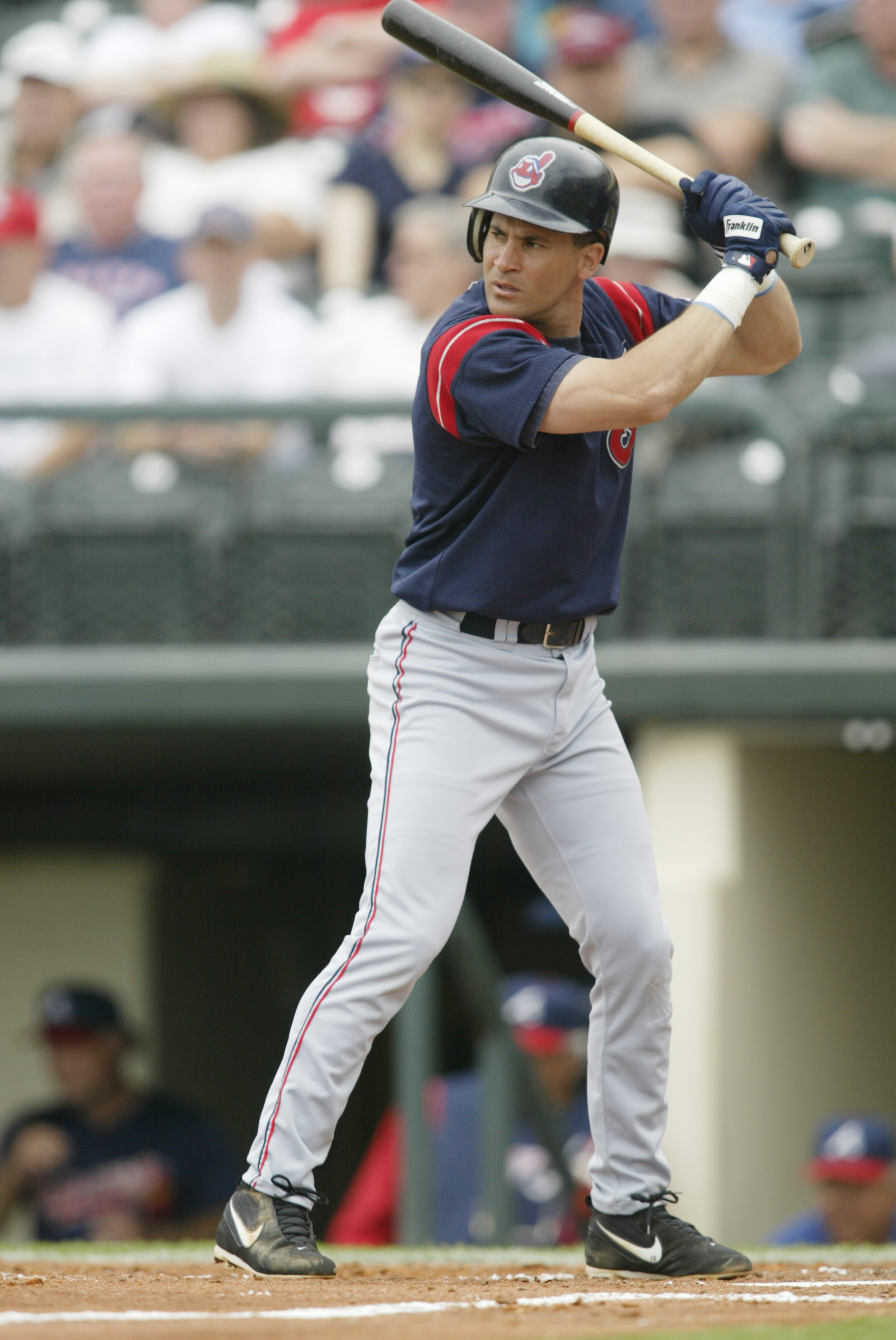 7 Mar 2002: Omar Vizquel #13 of the Cleveland Indians at bat against the Atlanta Braves during the spring training game at the Wide World of Sports Complex in Lake Buena Vista, Florida. DIGITAL IMAGE. Mandatory Credit: Andy Lyons/Getty Images