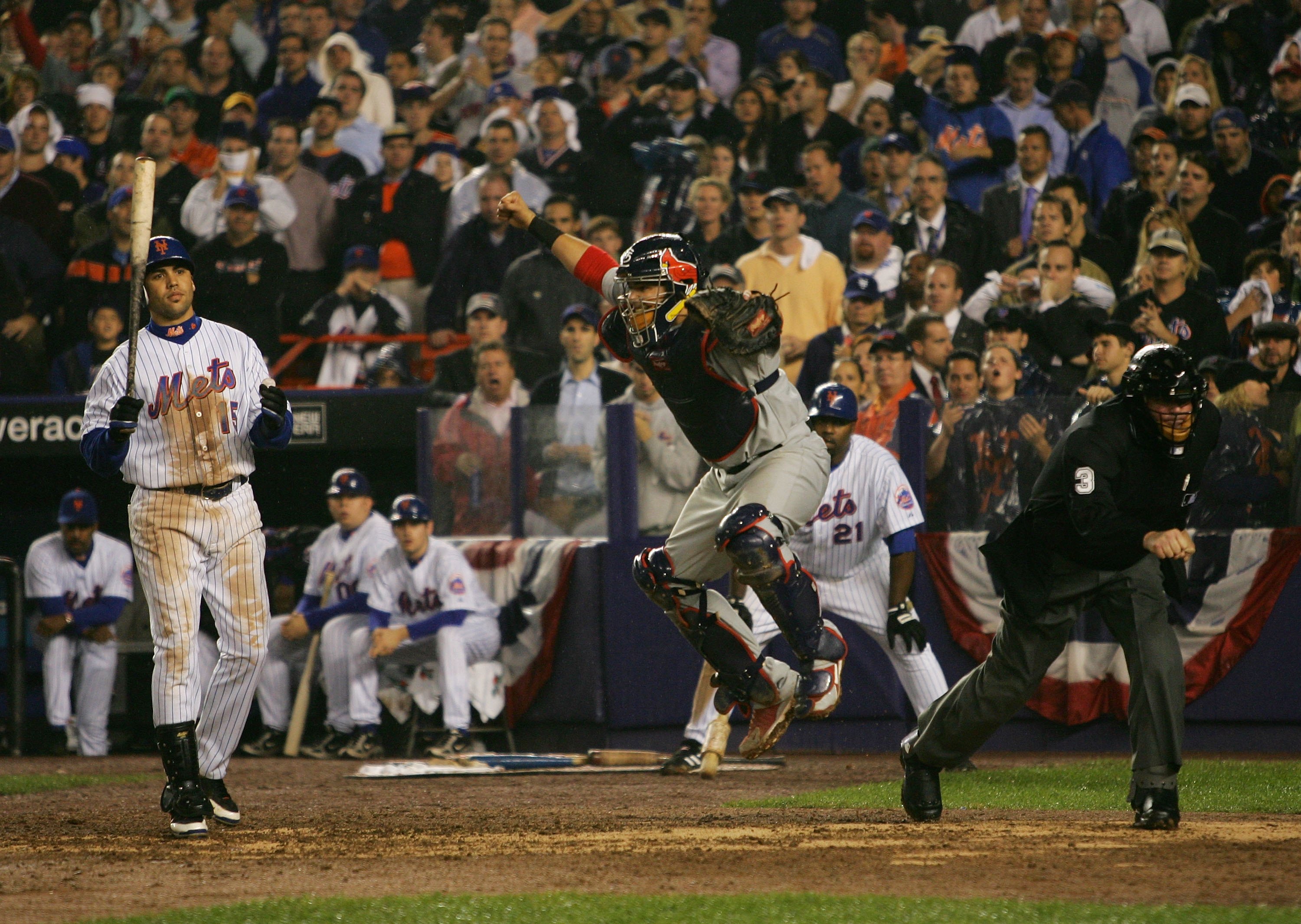 NEW YORK - OCTOBER 19:  Catcher Yadier Molina #4 of the St. Louis Cardinals reacts after Carlos Beltran #15 of the New York Mets stikes out to end game seven of the NLCS at Shea Stadium on October 19, 2006 in the Flushing neighborhood of the Queens boroug