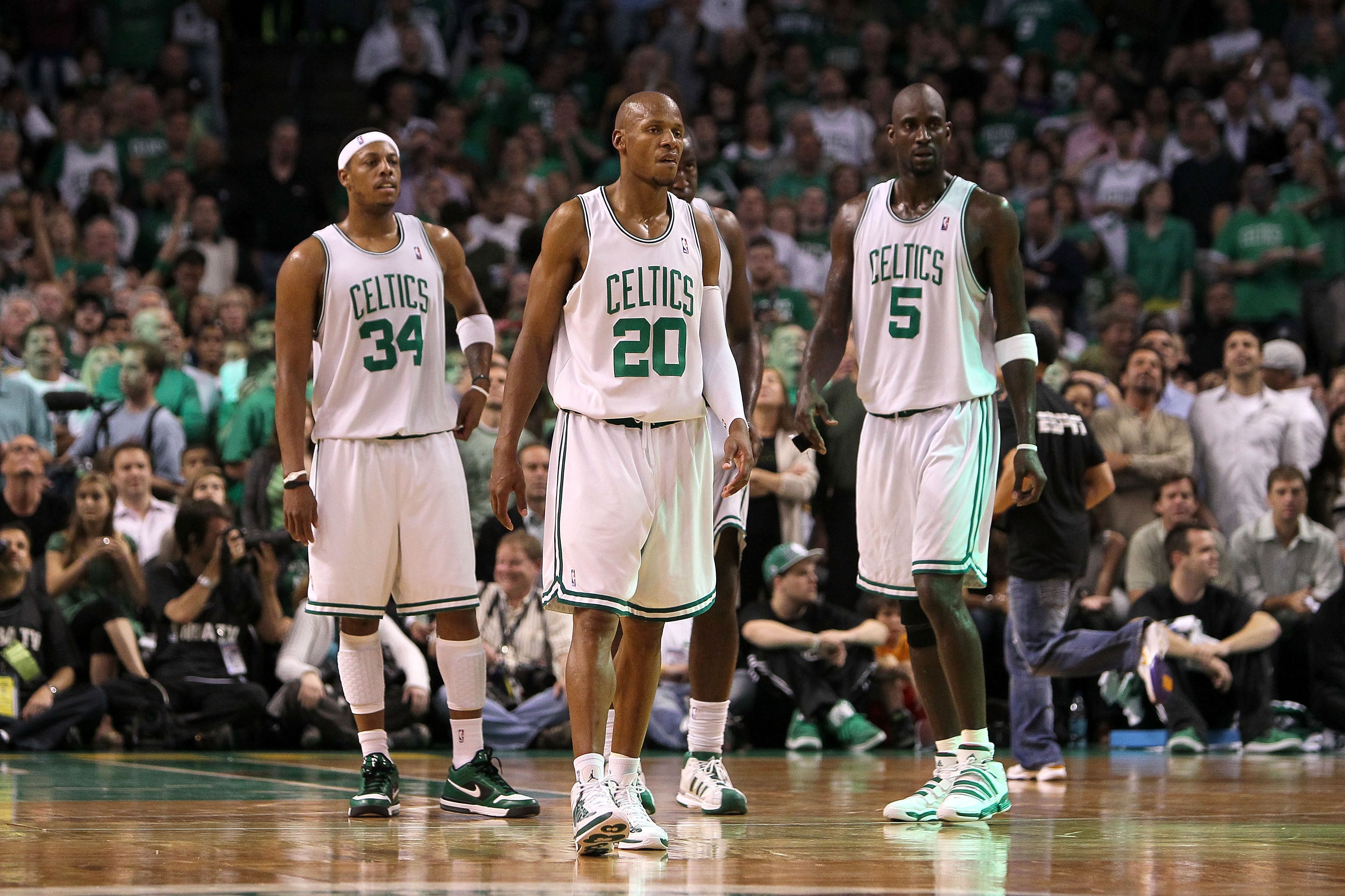 BOSTON - MAY 28:  (L-R) Paul PIerce #34, Ray Allen #20 and Kevin Garnett #5 of the Boston Celtics look on against the Orlando Magic in Game Six of the Eastern Conference Finals during the 2010 NBA Playoffs at TD Garden on May 28, 2010 in Boston, Massachus