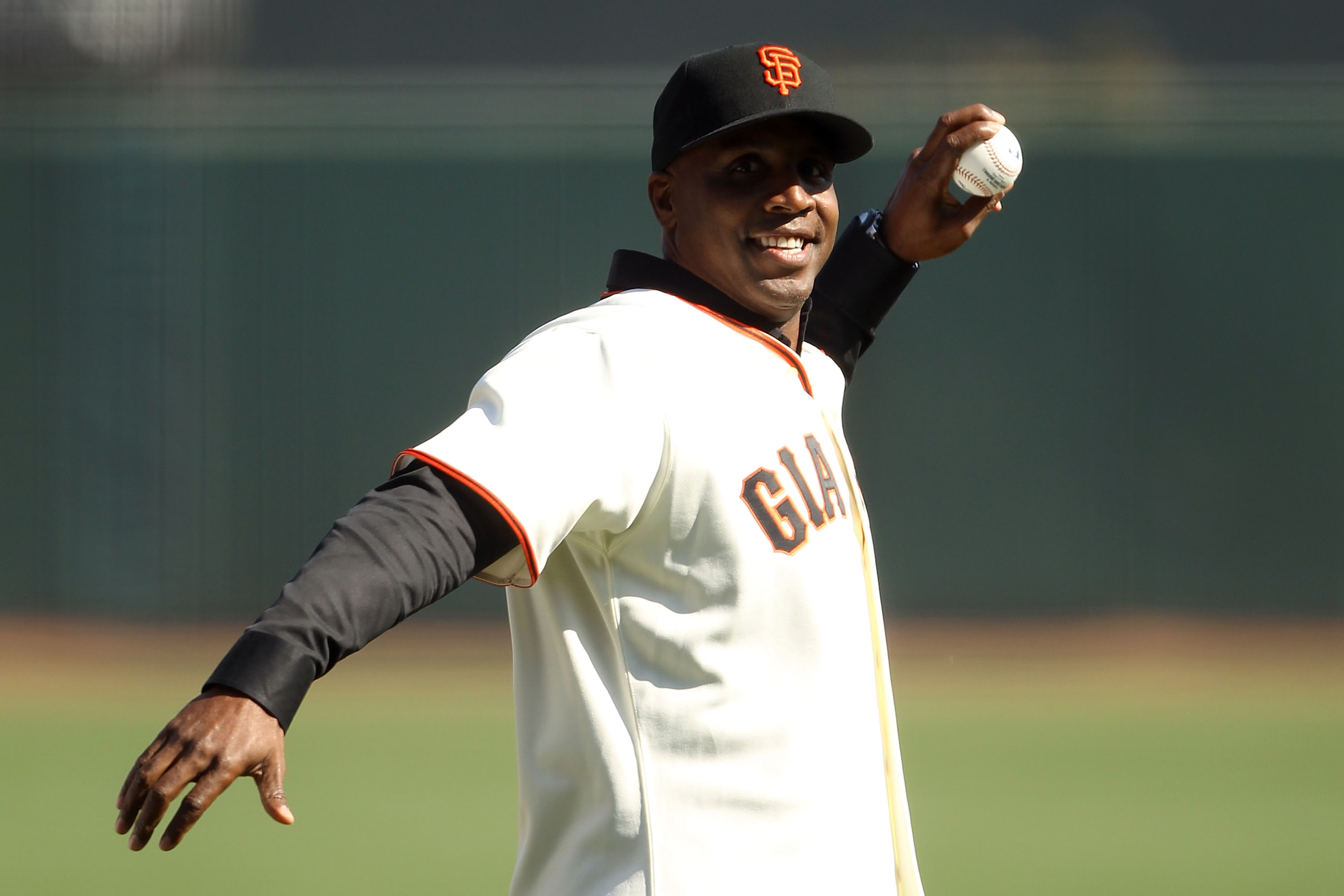 SAN FRANCISCO - OCTOBER 19:  Former San Francisco Giants outfielder Barry Bonds throws out the first pitch prior to Game Three of the NLCS against the San Francisco Giants during the 2010 MLB Playoffs at AT&T Park on October 19, 2010 in San Francisco, Cal