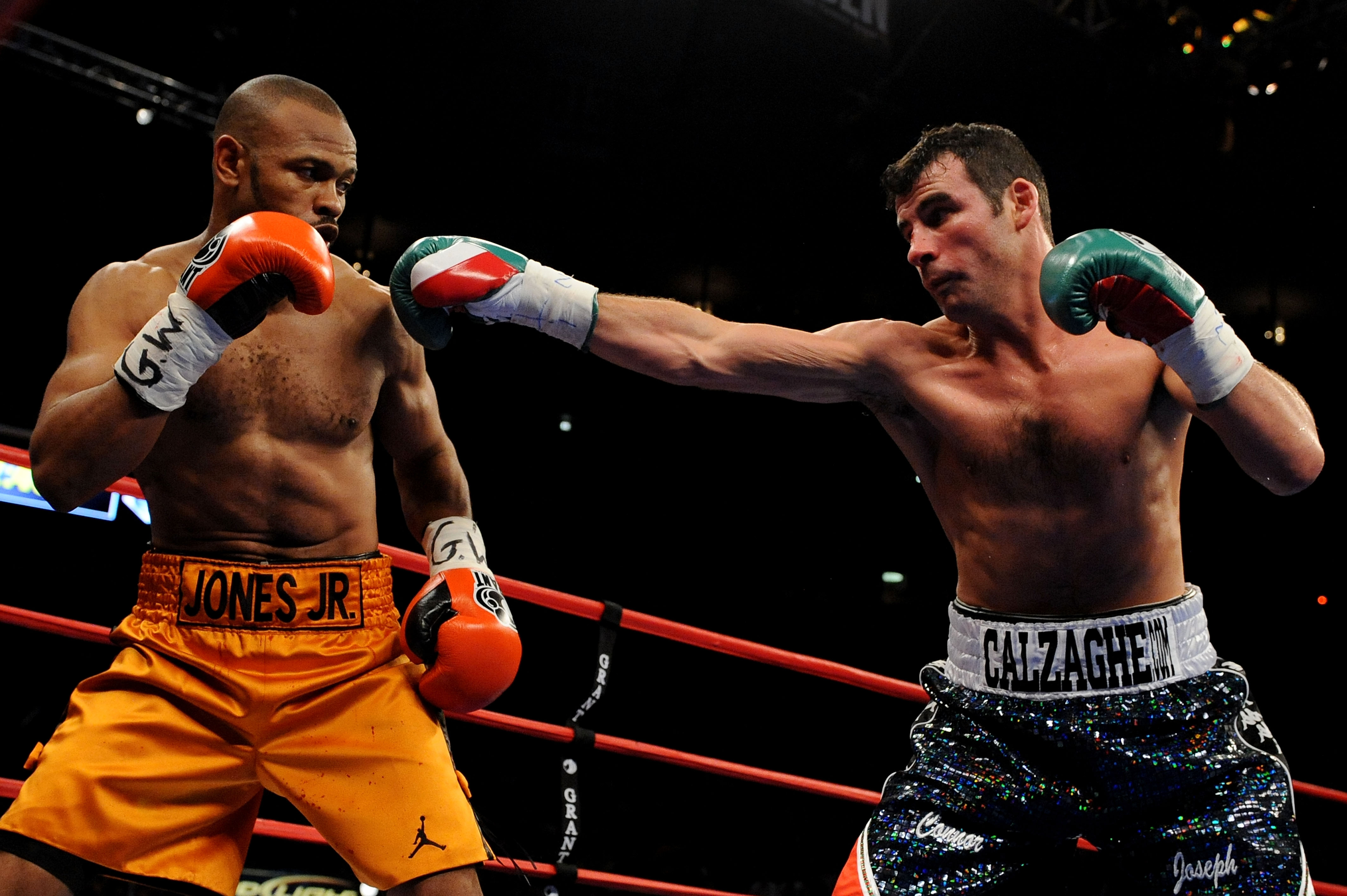 NEW YORK - NOVEMBER 08:  Joe Calzaghe (R) punches Roy Jones Jr (L) during their Ring Magazine Light Heavyweight Championship bout at Madison Square Garden November 8, 2008 in New York City.  (Photo by Al Bello/Getty Images)