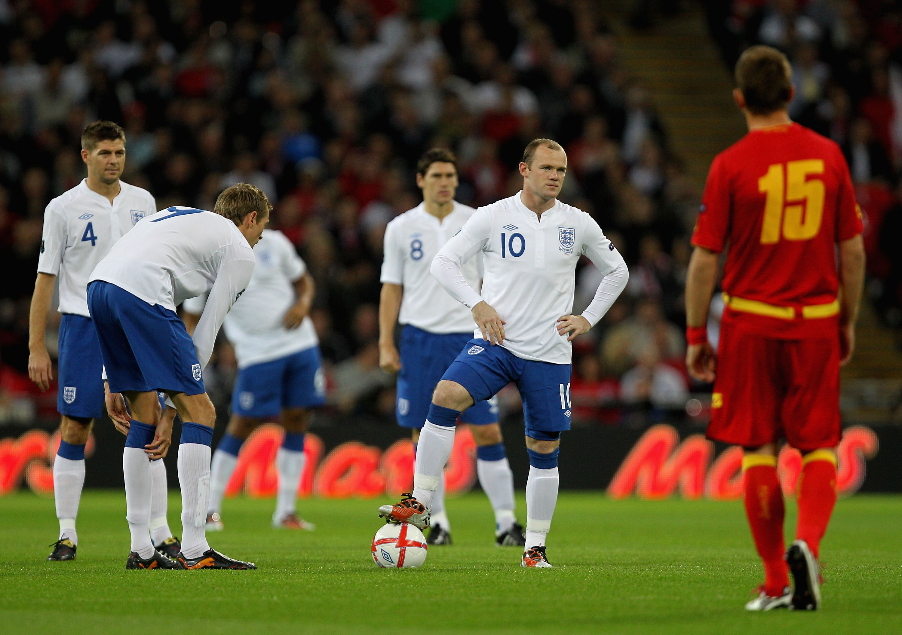 LONDON, ENGLAND - OCTOBER 12:  Wayne Rooney of England looks dejected during the UEFA EURO 2012 Group G Qualifying match between England and Montenegro at Wembley Stadium on October 12, 2010 in London, England.  (Photo by Hamish Blair/Getty Images)