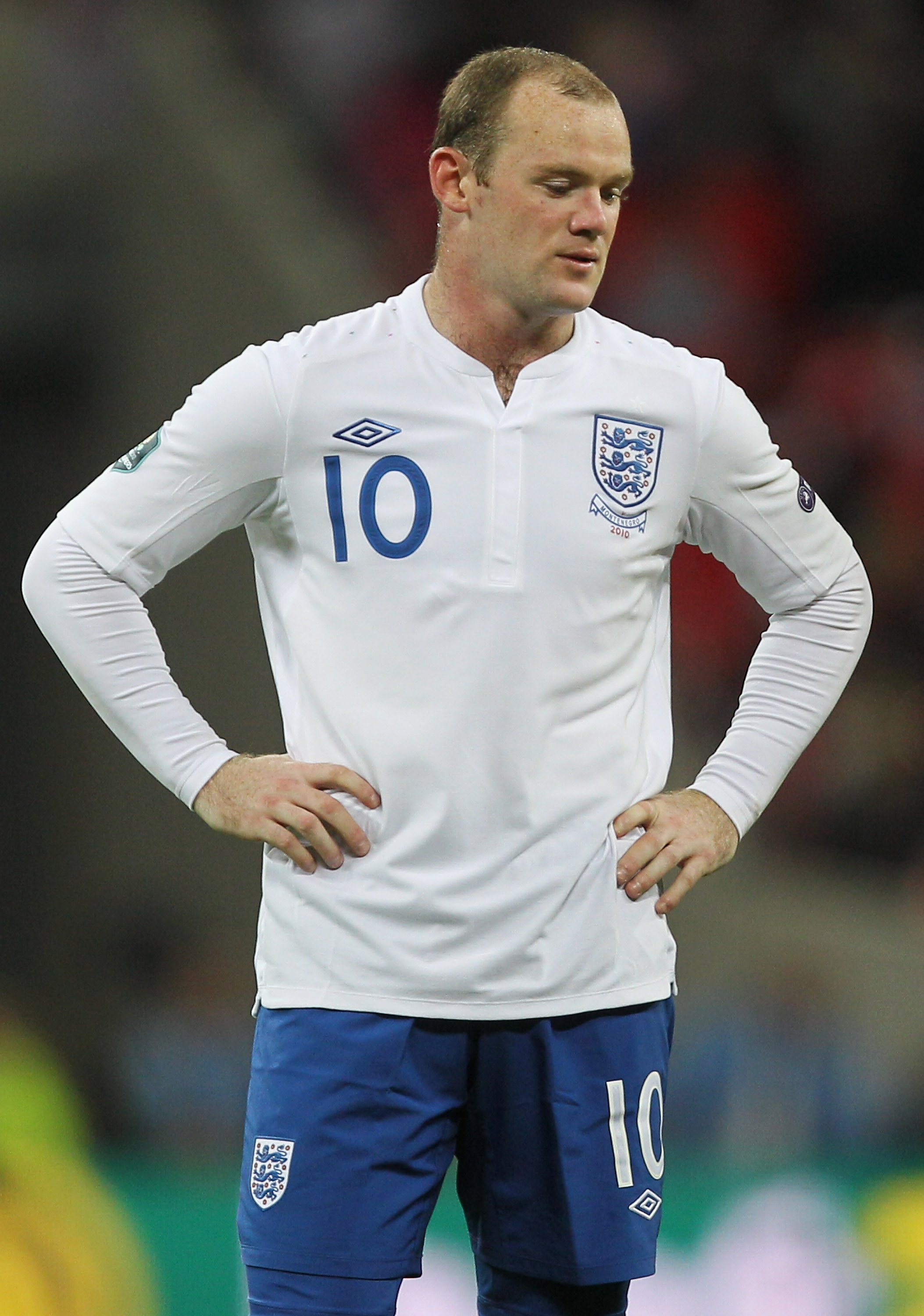 LONDON, ENGLAND - OCTOBER 12: Wayne Rooney of England looks dejected during the UEFA EURO 2012 Group G Qualifying match between England and Montenegro at Wembley Stadium on October 12, 2010 in London, England.  (Photo by Hamish Blair/Getty Images)