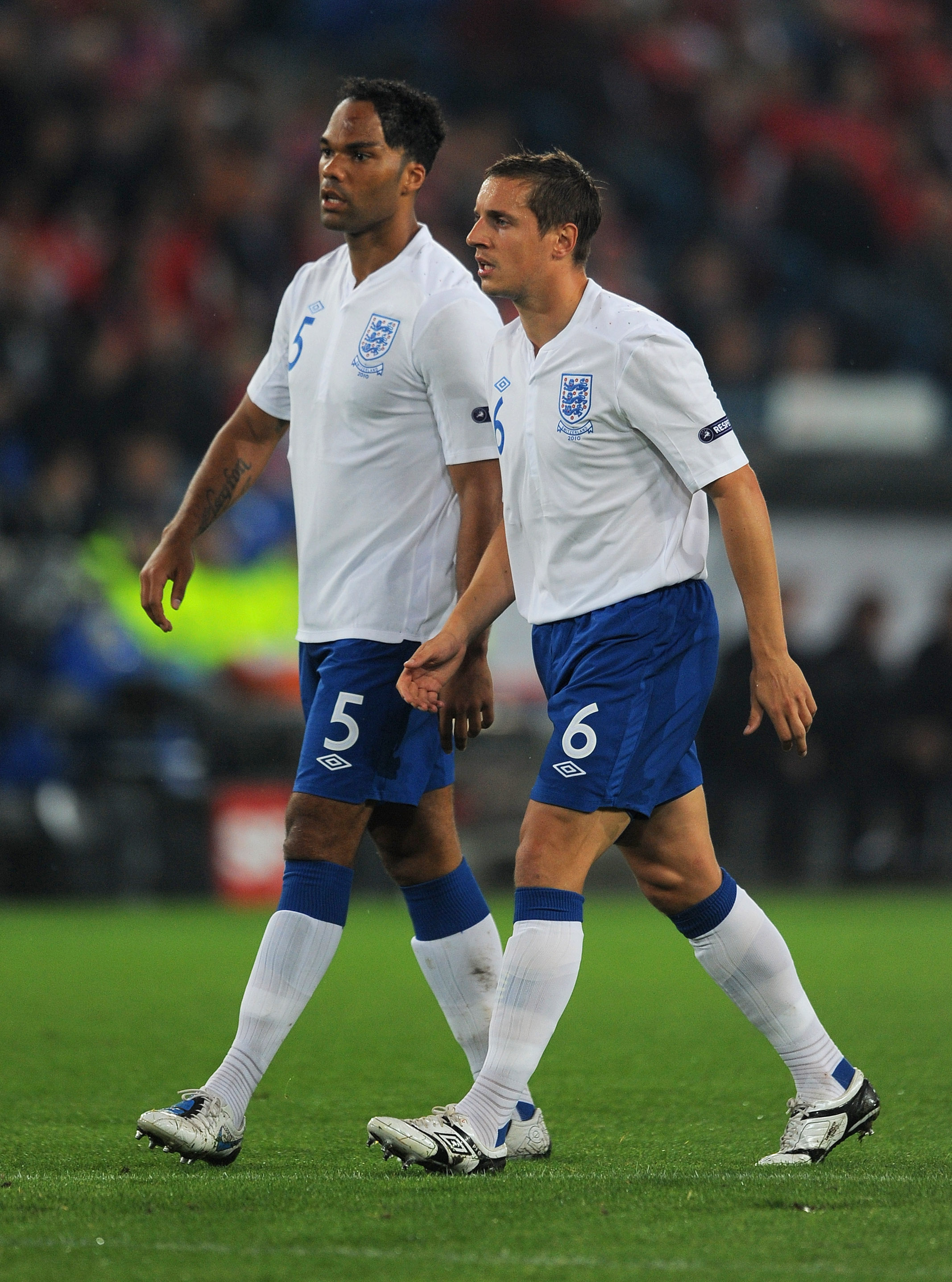 BASEL, SWITZERLAND - SEPTEMBER 07:  Joleon Lescott and Phil Jagielka of England look on during the EURO 2012 Group G Qualifier between Switzerland and England at St Jakob Park on September 7, 2010 in Basel, Switzerland.  (Photo by Michael Regan/Getty Imag