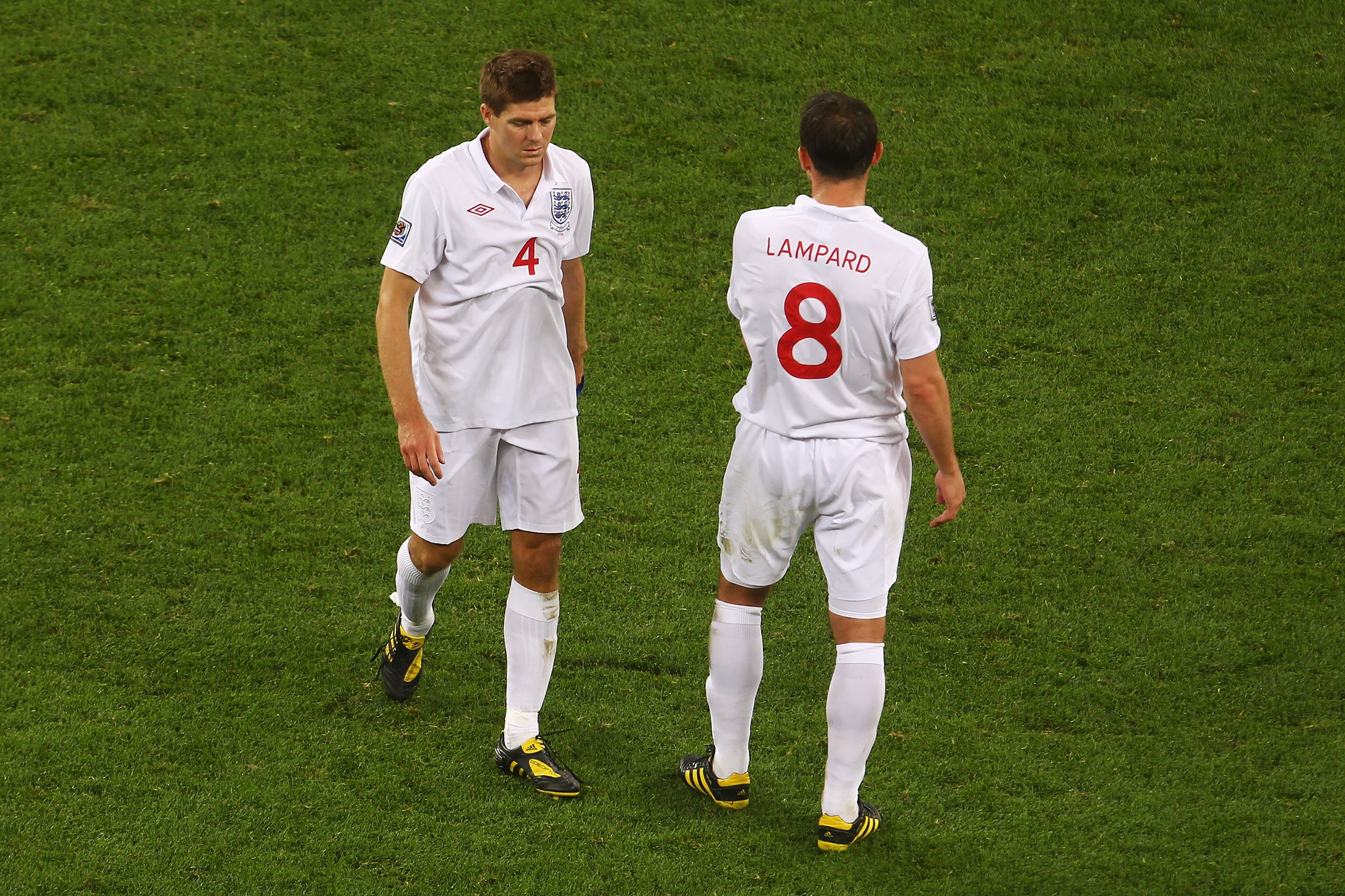 CAPE TOWN, SOUTH AFRICA - JUNE 18:  Captain Steven Gerrard and Frank Lampard of England look dejected during the 2010 FIFA World Cup South Africa Group C match between England and Algeria at Green Point Stadium on June 18, 2010 in Cape Town, South Africa.
