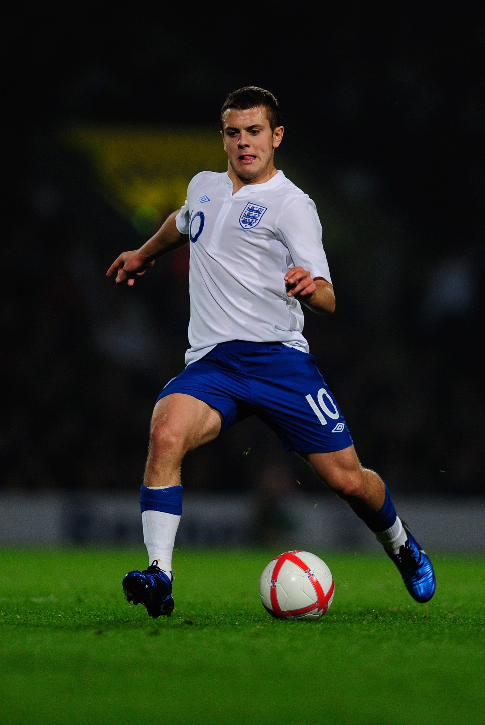 NORWICH, ENGLAND - OCTOBER 08:  Jack Wilshere of England in action during the UEFA U21 Championship Play-Off, First Leg match between England and Romania at Carrow Road on October 8, 2010 in Norwich, England.  (Photo by Jamie McDonald/Getty Images)