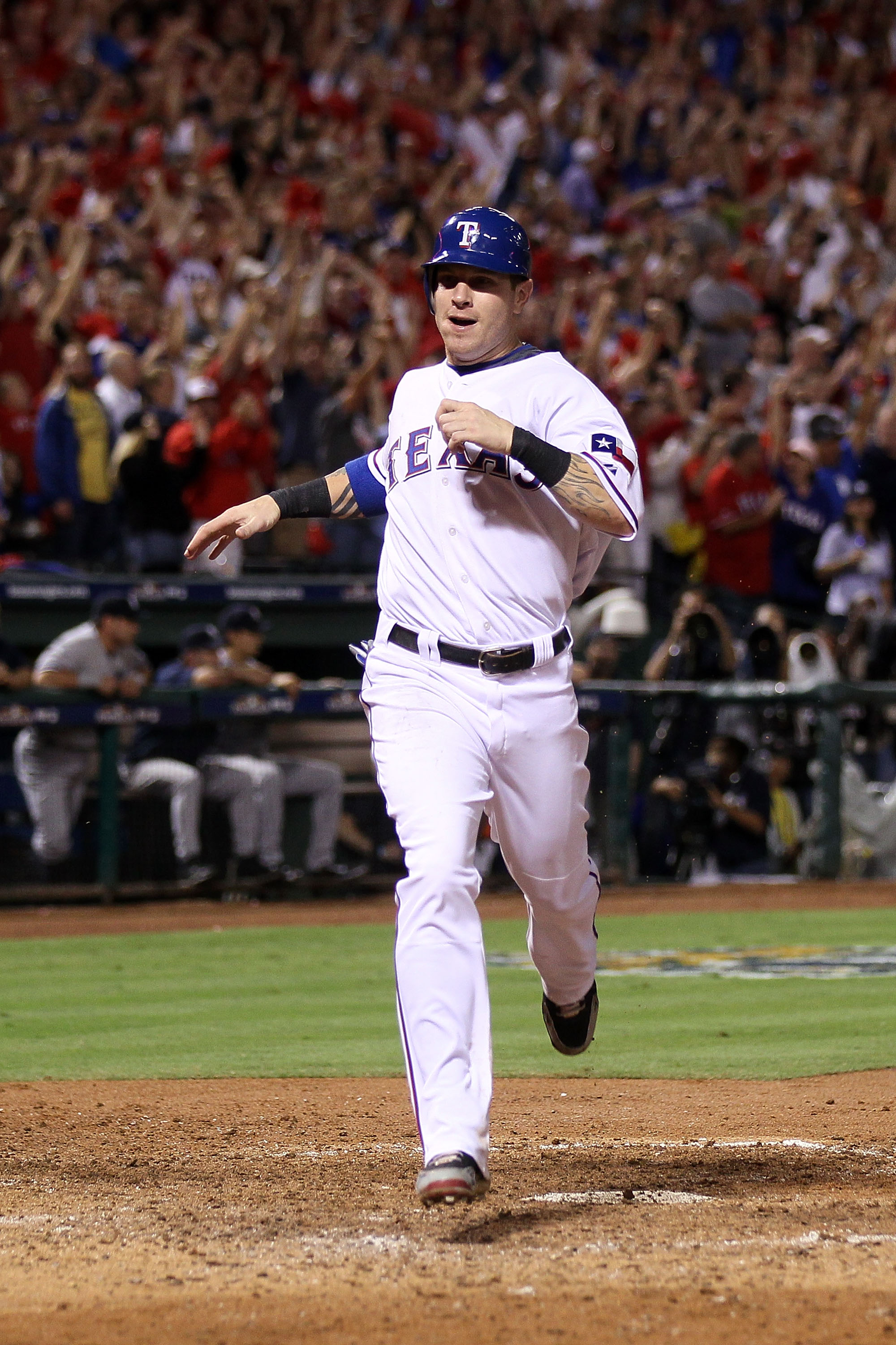 ARLINGTON, TX - OCTOBER 22:  Josh Hamilton #32 of the Texas Rangers crosses home plate to score in the fifth inning of Game Six of the ALCS against the New York Yankees during the 2010 MLB Playoffs at Rangers Ballpark in Arlington on October 22, 2010 in A