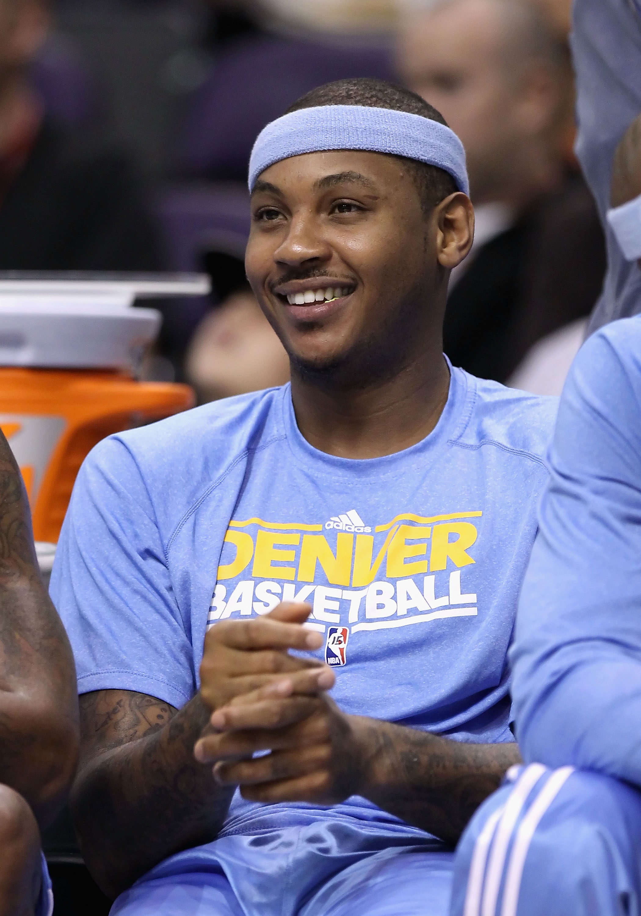 Denver Nuggets forward Carmelo Anthony smiles during warm ups