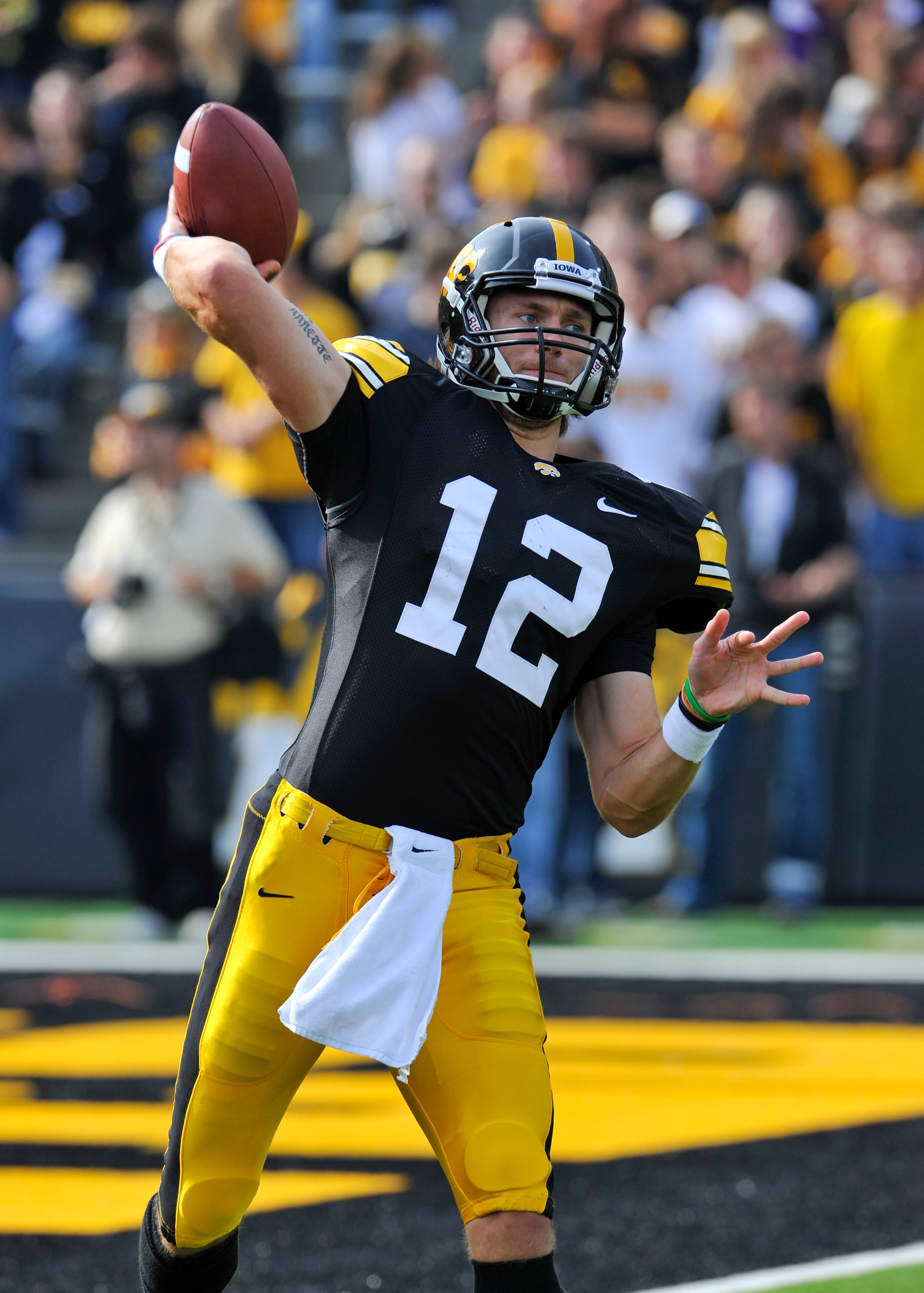 IOWA CITY, IA - OCTOBER 23- Quarterback Ricky Stanzi #12 of the University of Iowa Hawkeyes warms up before action against the Wisconsin Badgers at Kinnick Stadium on October 23, 2010 in Iowa City, Iowa. Wisconsin won 31-30 over Iowa. (Photo by David Purd