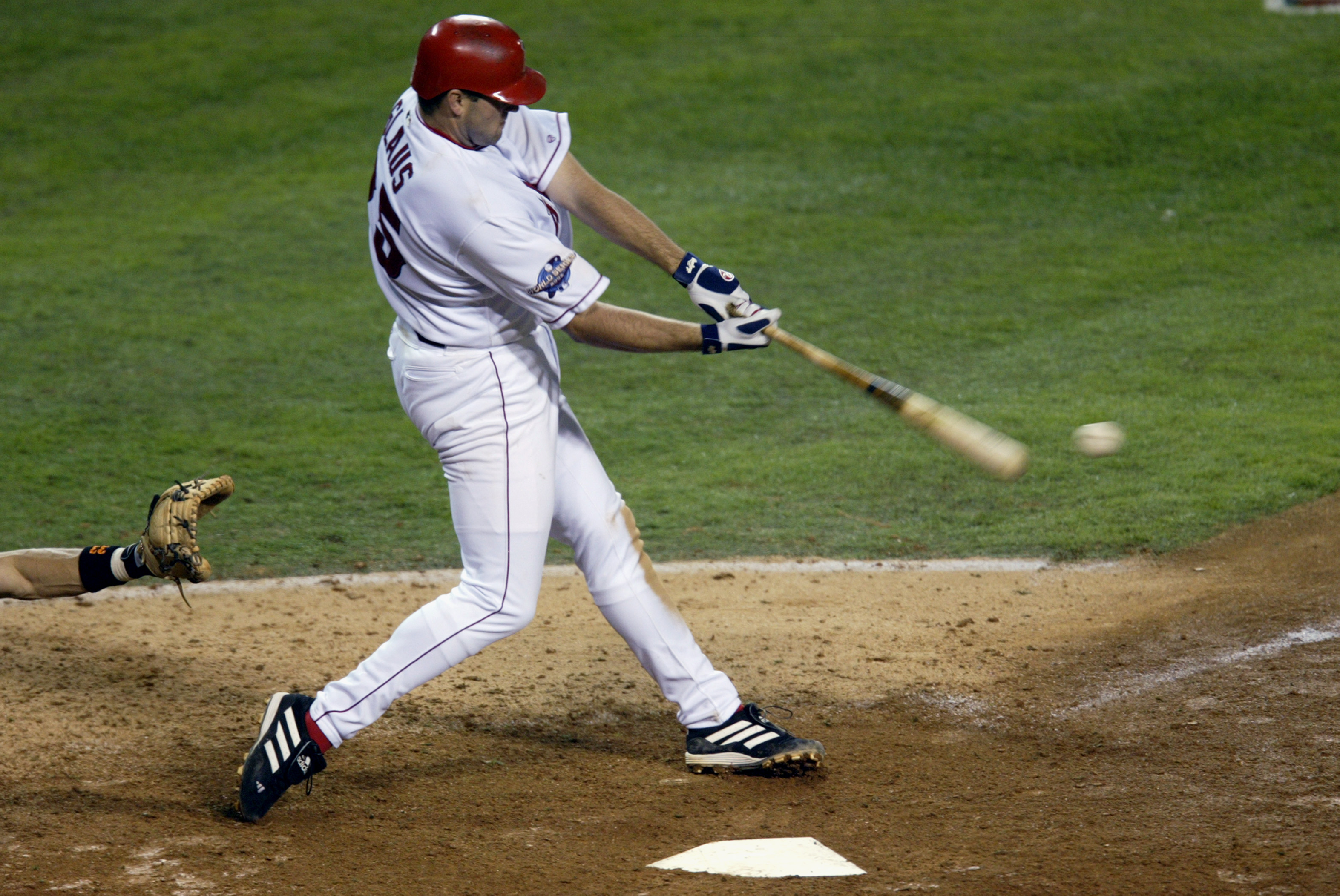 Troy Glaus of the Anaheim Angels holds up the World Series trophy News  Photo - Getty Images