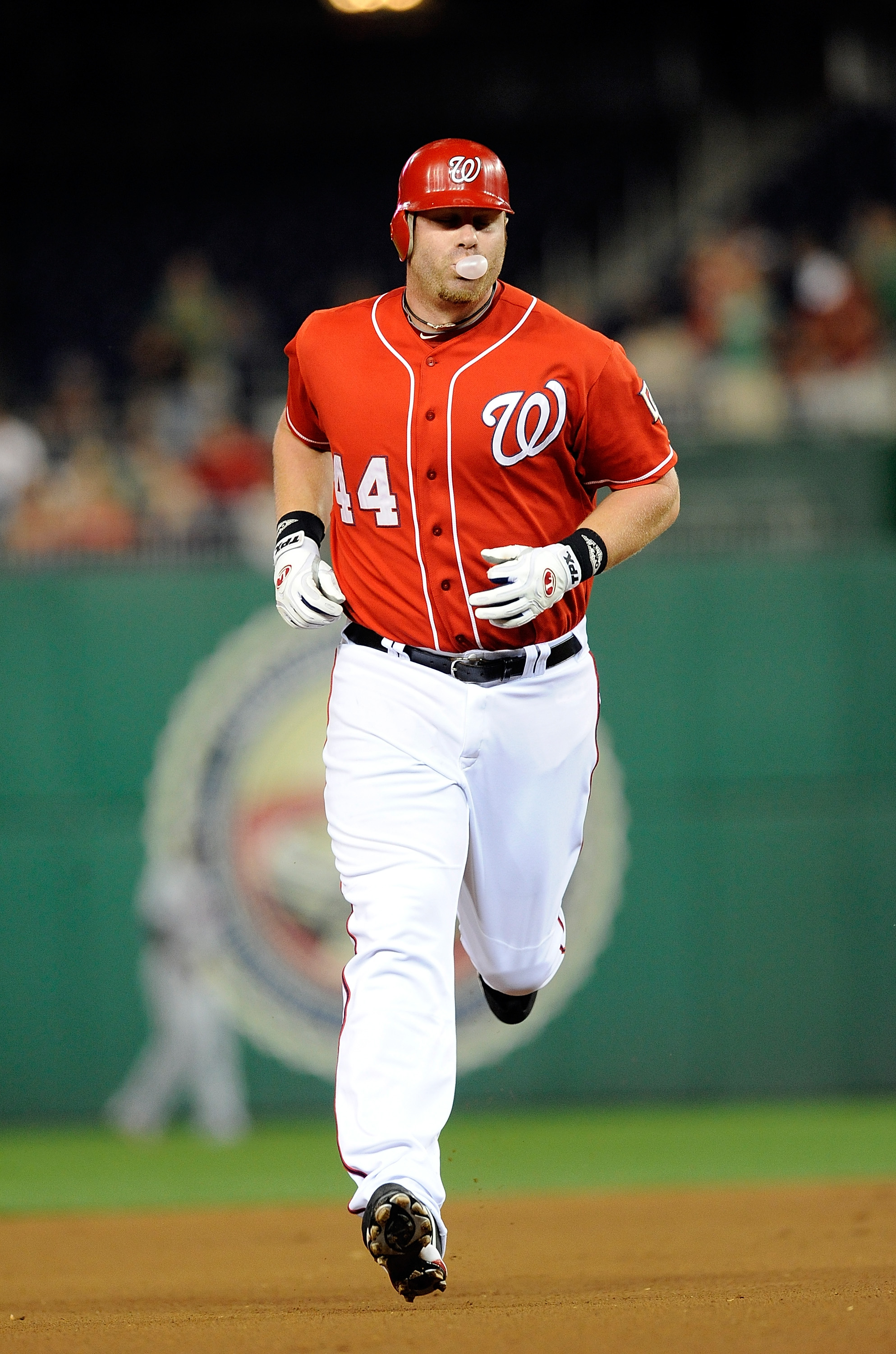 WASHINGTON - SEPTEMBER 24:  Adam Dunn #44 of the Washington Nationals rounds the bases after hitting a home run in the second inning against the Atlanta Braves at Nationals Park on September 24, 2010 in Washington, DC.  (Photo by Greg Fiume/Getty Images)