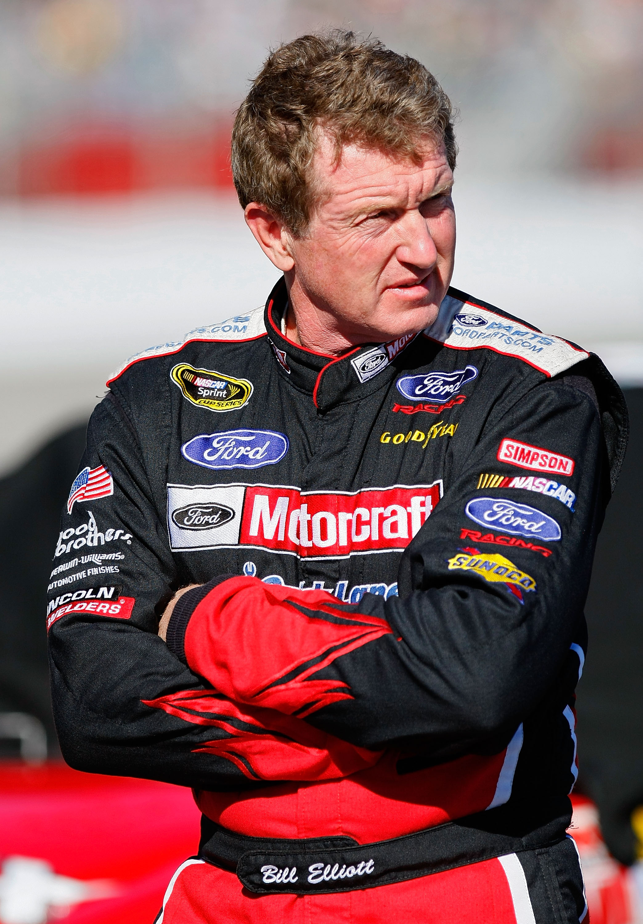 HAMPTON, GA - SEPTEMBER 04: Bill Elliott, driver of the #21 FordParts.com Ford, stands on the grid during qualifying for the NASCAR Sprint Cup Series Emory Healthcare 500 at Atlanta Motor Speedway on September 4, 2010 in Hampton, Georgia.  (Photo by Geoff