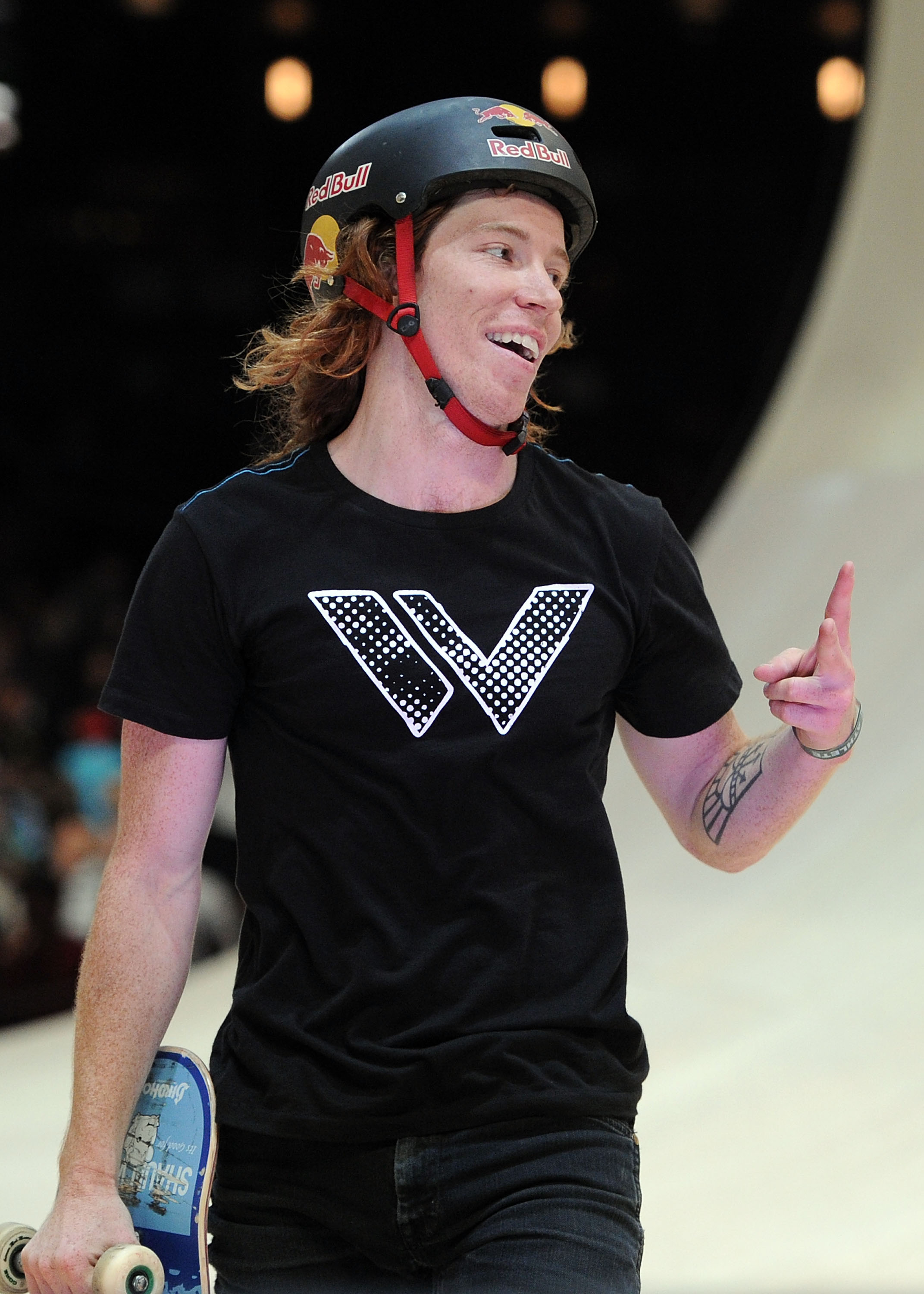 LOS ANGELES, CA - JULY 30:   Shaun White smiles as he leaves the ramp after a run as he competes in the Skateboard Vert Final during X Games 16 at the Nokia Theatre LA Live on July 30, 2010 in Los Angeles, California.  (Photo by Harry How/Getty Images)