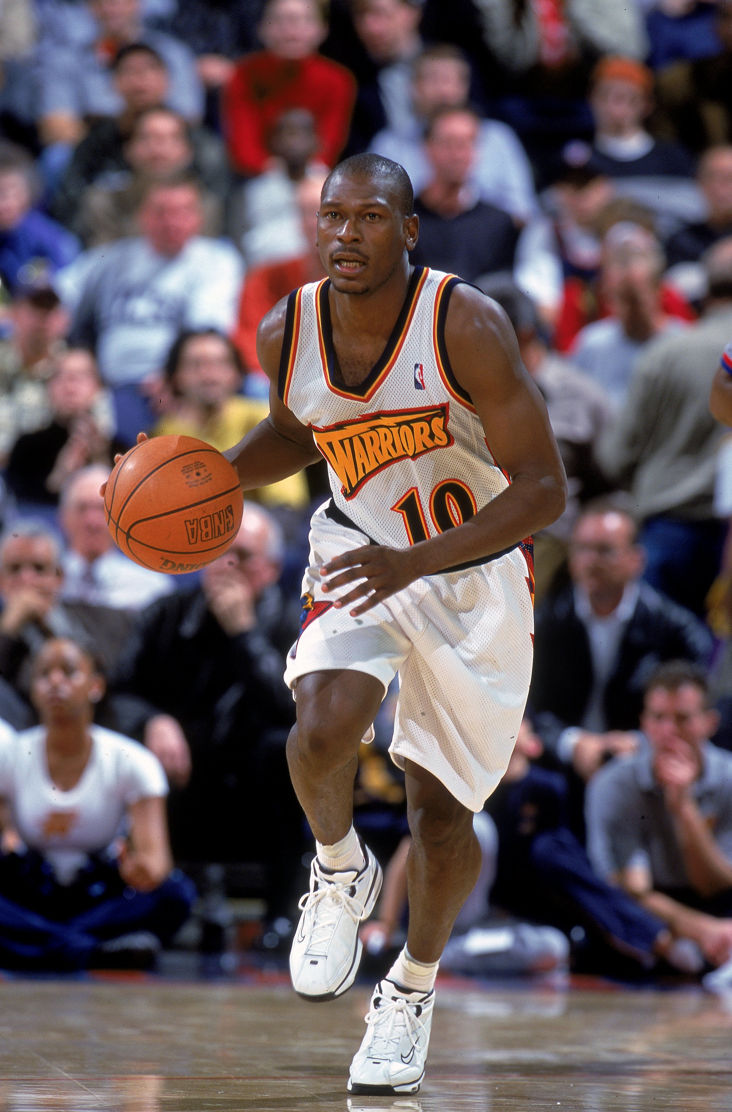 6 Dec 2000:  Mookie Blaylock #10 of the Golden State Warriors dribbles the ball down the court during the game against the Los Angeles Lakers at the Arena in Oakland in Oakland, California. The Warriors defeated the Lakers 125-122. NOTE TO USER: It is exp
