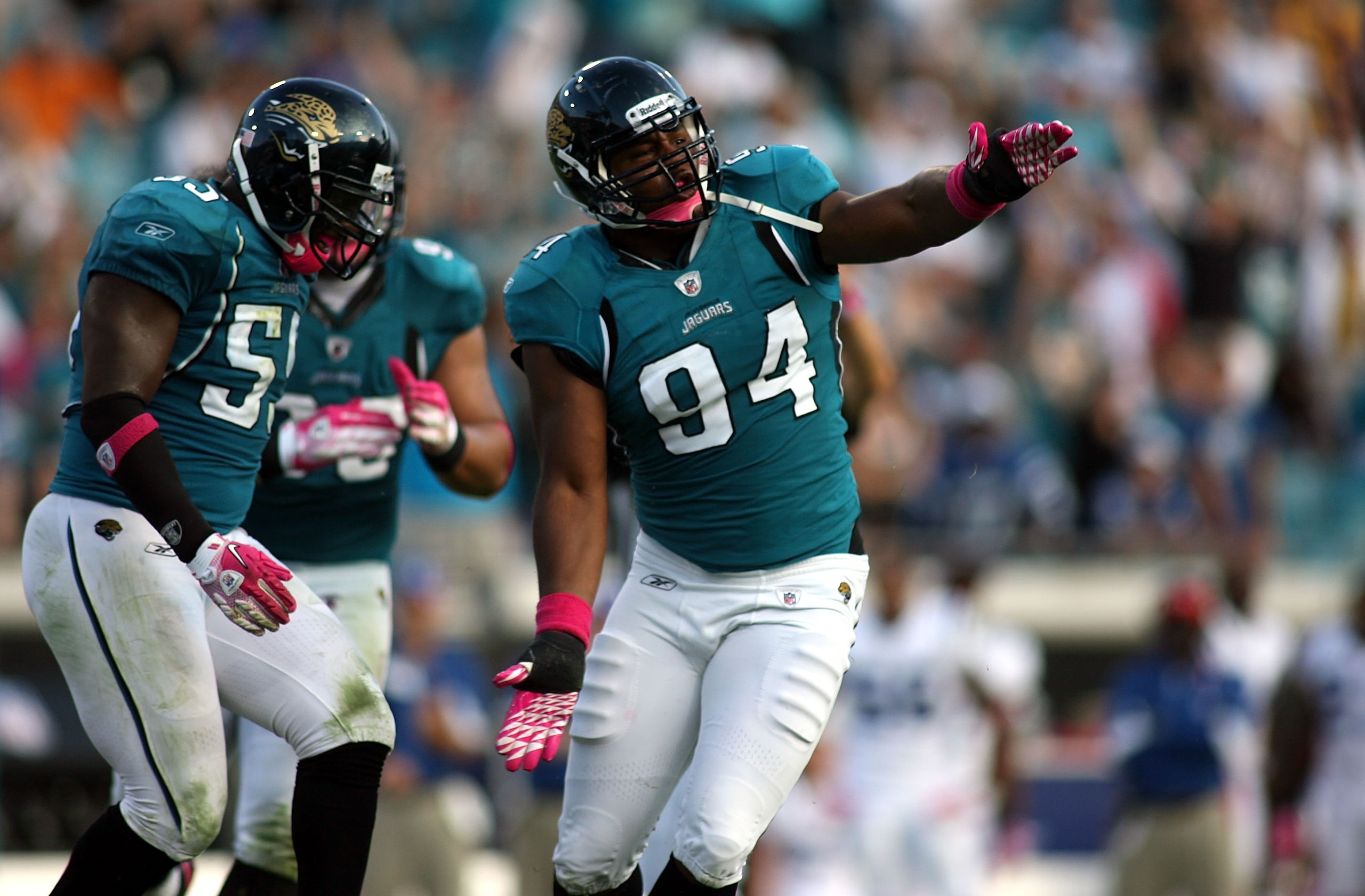 JACKSONVILLE, FL - OCTOBER 03: Lineman Jeremy Mincey #94 of the Jacksonville Jaguars celebrates with Kirk Morreson after sacking Quarterback Peyton Manning #18 of the Indianapolis Colts at EverBank Field on October 3, 2010 in Jacksonville, Florida. (Pho JACKSONVILLE, FL - OCTOBER 03: Lineman Jeremy Mincey #94 of the Jacksonville Jaguars celebrates with Kirk Morreson after sacking Quarterback Peyton Manning #18 of the Indianapolis Colts at EverBank Field on October 3, 2010 in Jacksonville, Florida. (Pho