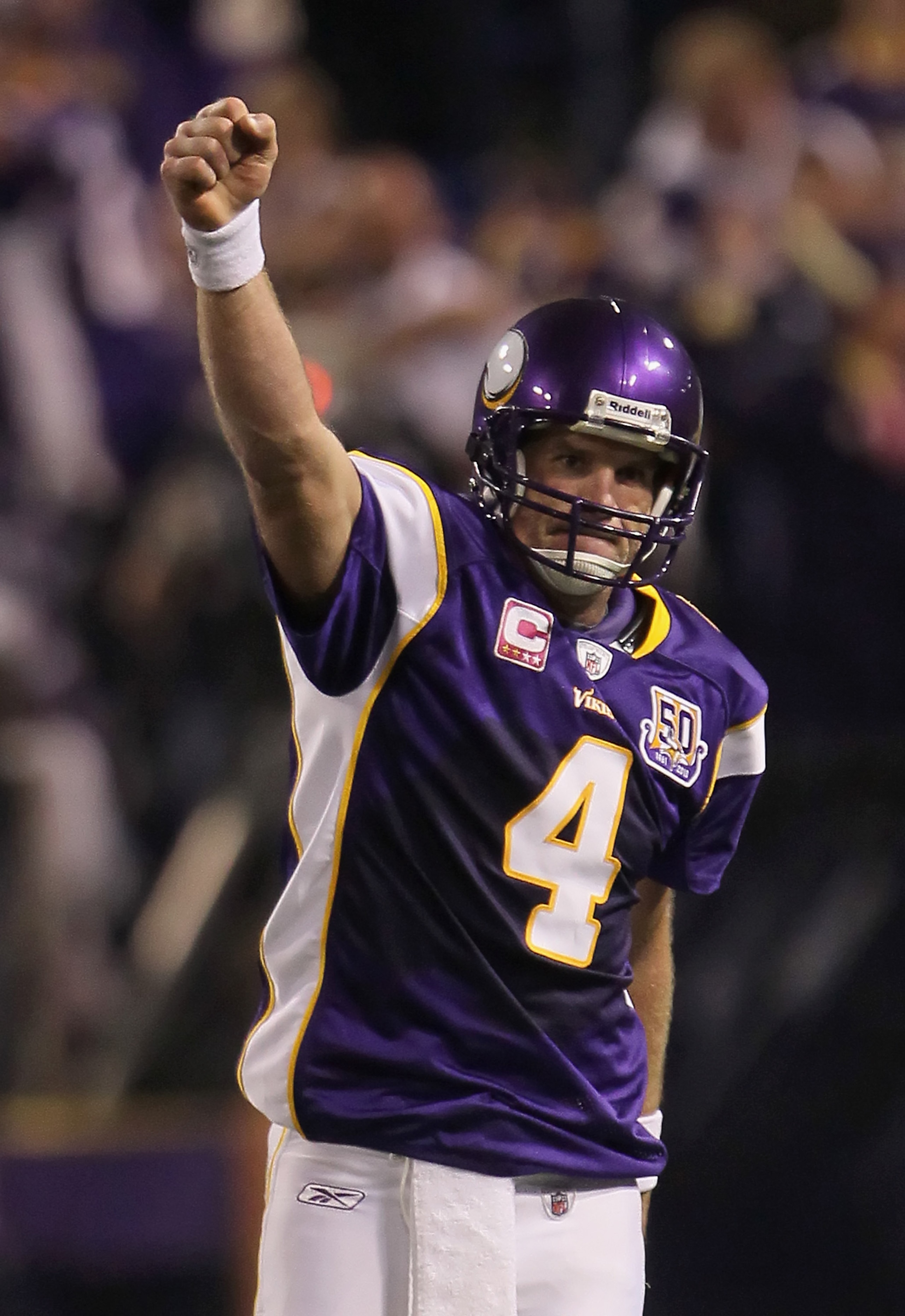 MINNEAPOLIS - OCTOBER 17: Quarterback Brett Favre #4 of the Minnesota Vikings celebrates a pass interference call against Mike Jenkins (not pictured) of the Dallas Cowboys during the fourth quarter at Mall of America Field on October 17, 2010 in Minneapo MINNEAPOLIS - OCTOBER 17: Quarterback Brett Favre #4 of the Minnesota Vikings celebrates a pass interference call against Mike Jenkins (not pictured) of the Dallas Cowboys during the fourth quarter at Mall of America Field on October 17, 2010 in Minneapo