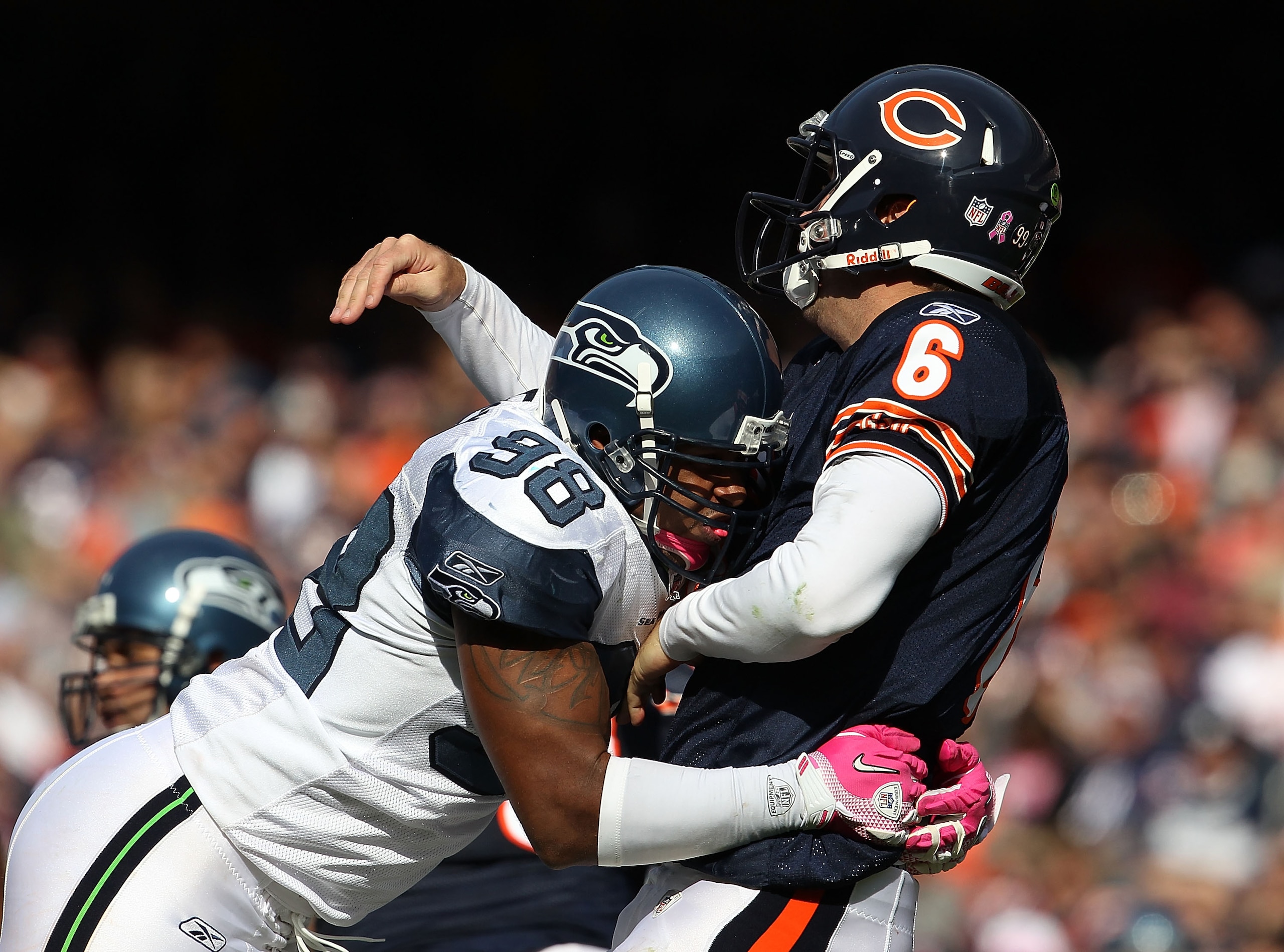 CHICAGO - OCTOBER 17: Jay Cutler #6 of the Chicago Bears is hit after throwing by Raheem Brock #98 of the Seattle Seahawks at Soldier Field on October 17, 2010 in Chicago, Illinois. The Seahawks defeated the Bears 23-20. (Photo by Jonathan Daniel/Getty Im CHICAGO - OCTOBER 17: Jay Cutler #6 of the Chicago Bears is hit after throwing by Raheem Brock #98 of the Seattle Seahawks at Soldier Field on October 17, 2010 in Chicago, Illinois. The Seahawks defeated the Bears 23-20. (Photo by Jonathan Daniel/Getty Im