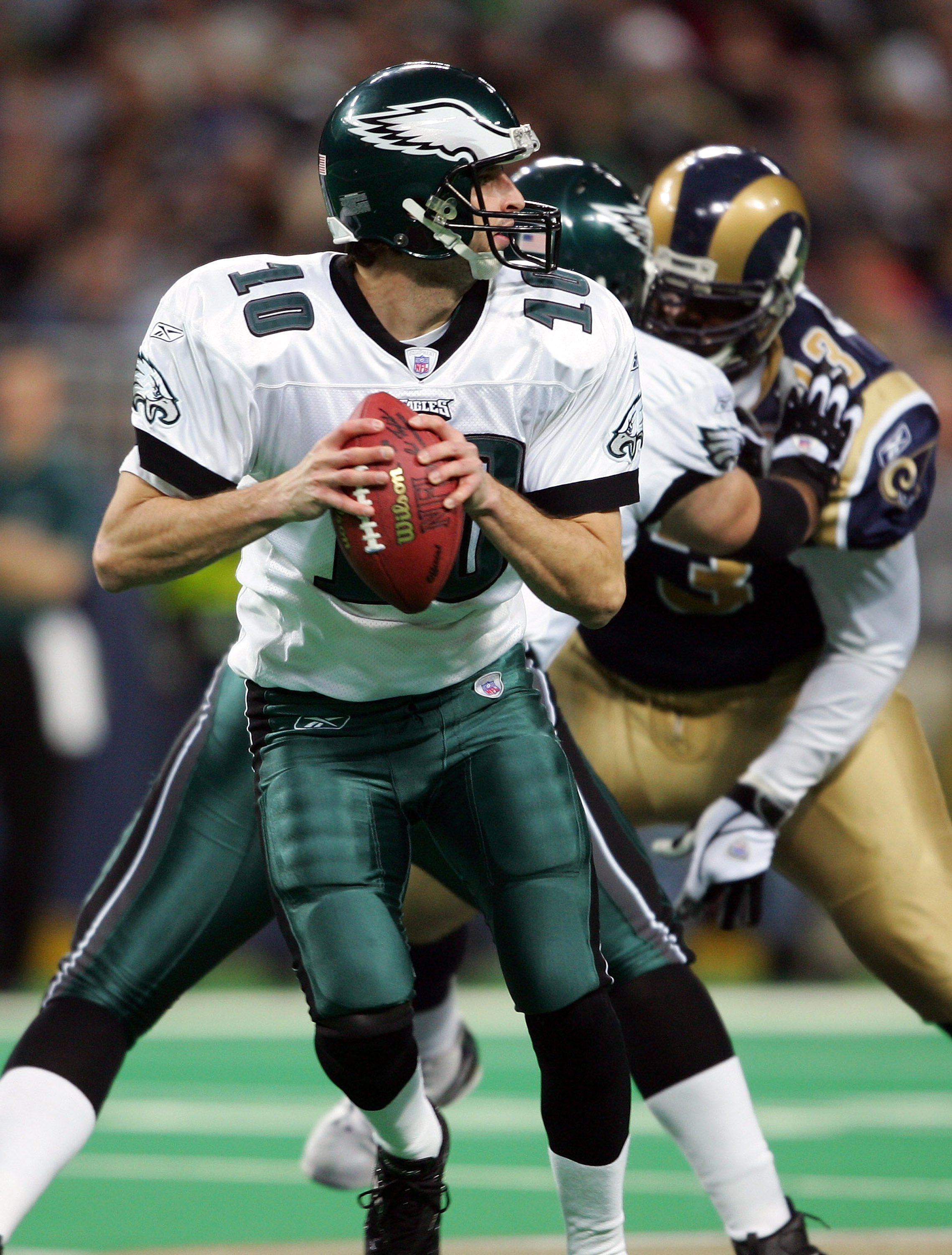 Philadelphia Eagles quarterback Donovan McNabb talks to teammates on the  sidelines during their game against the St. Louis Rams at the Edward Jones  Dome in St. Louis on December 27, 2004. McNabb