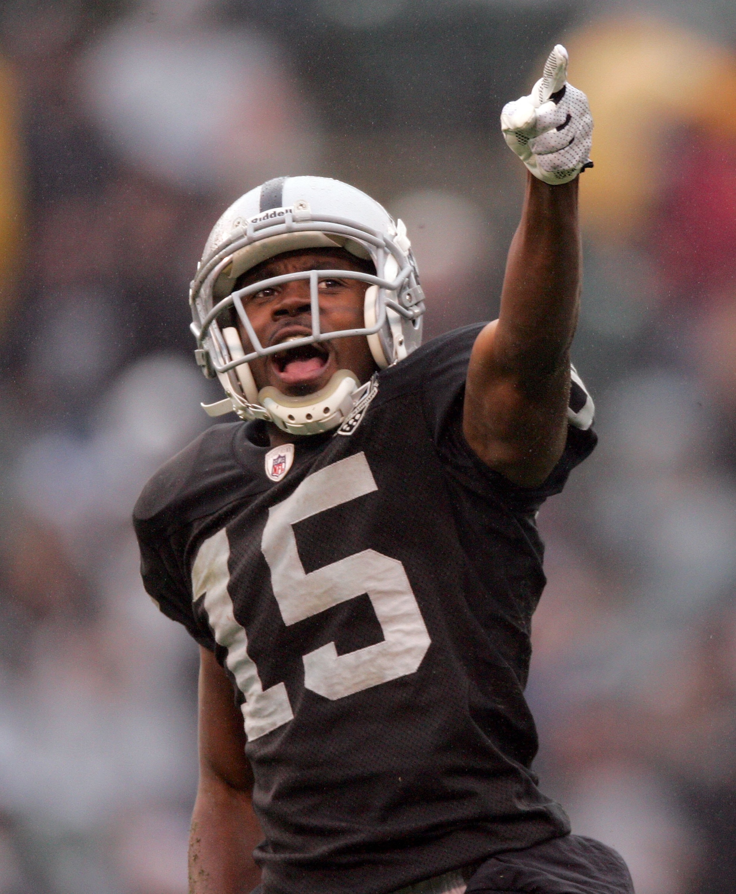 OAKLAND, CA - DECEMBER 13: Johnnie Lee Higgins #15 of the Oakland Raiders reacts during their game against the Washington Redskins at Oakland-Alameda County Coliseum on December 13, 2009 in Oakland, California. (Photo by Ezra Shaw/Getty Images) OAKLAND, CA - DECEMBER 13: Johnnie Lee Higgins #15 of the Oakland Raiders reacts during their game against the Washington Redskins at Oakland-Alameda County Coliseum on December 13, 2009 in Oakland, California. (Photo by Ezra Shaw/Getty Images)