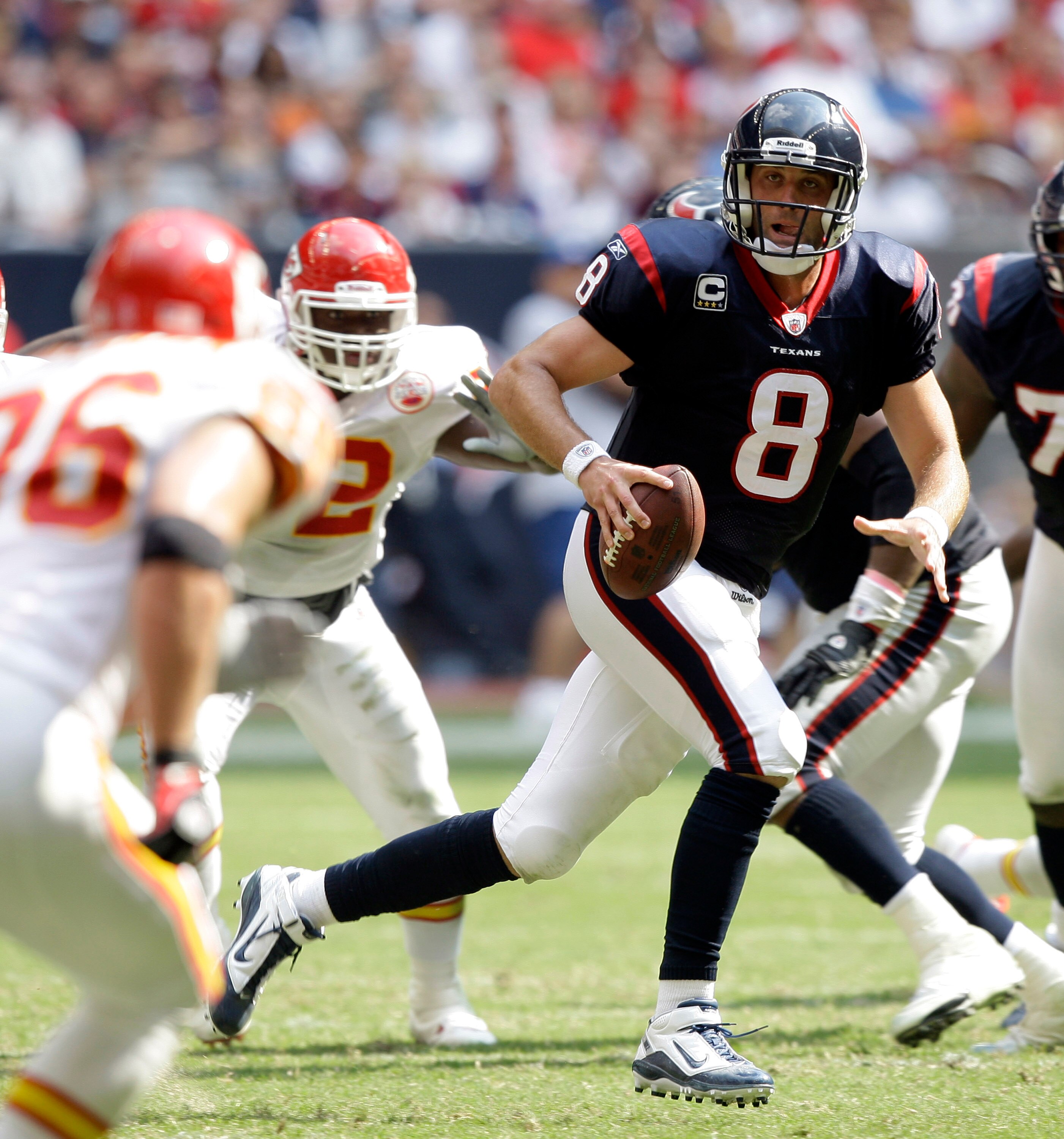 HOUSTON - OCTOBER 17:  Quarterback Matt Schaub #8 of the Houton Texans scrambles out of the pocket as he looks for a receiver agasint the Kasnas City Chiefs at Reliant Stadium on October 17, 2010 in Houston, Texas.  (Photo by Bob Levey/Getty Images)