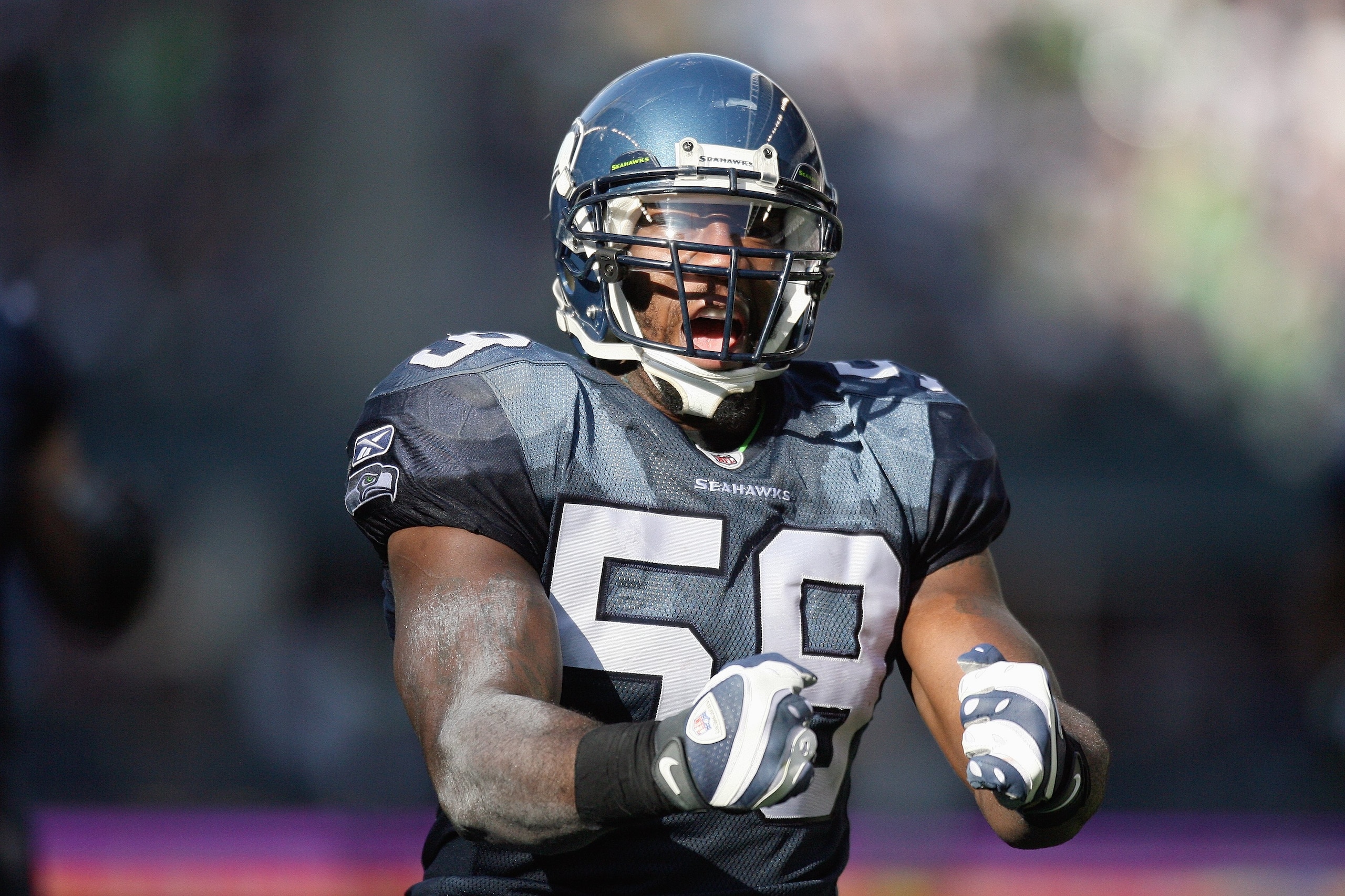 SEATTLE - OCTOBER 11: Aaron Curry #59 of the Seattle Seahawks celebrates during the game against the Jacksonville Jaguars on October 11, 2009 at Qwest Field in Seattle, Washington. The Seahawks defeated the Jaguars 41-0. (Photo by Otto Greule Jr/Getty Ima SEATTLE - OCTOBER 11: Aaron Curry #59 of the Seattle Seahawks celebrates during the game against the Jacksonville Jaguars on October 11, 2009 at Qwest Field in Seattle, Washington. The Seahawks defeated the Jaguars 41-0. (Photo by Otto Greule Jr/Getty Ima