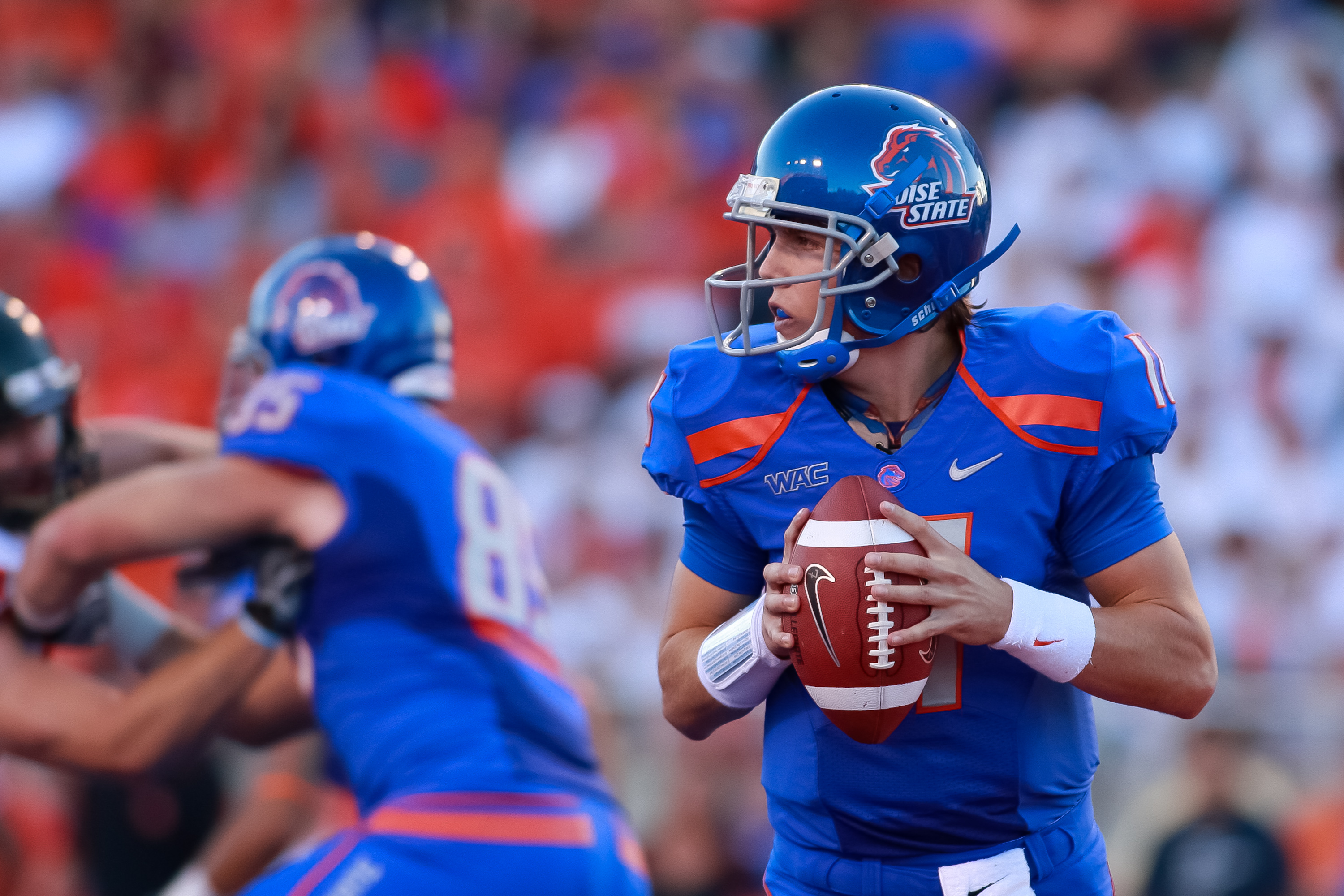 Boise State quarterback Kellen Moore #11 during the NCAA football game  between the Boise State University Broncos and the Texas Christian  University Horned Frogs at the University of Phoenix Stadium in Glendale