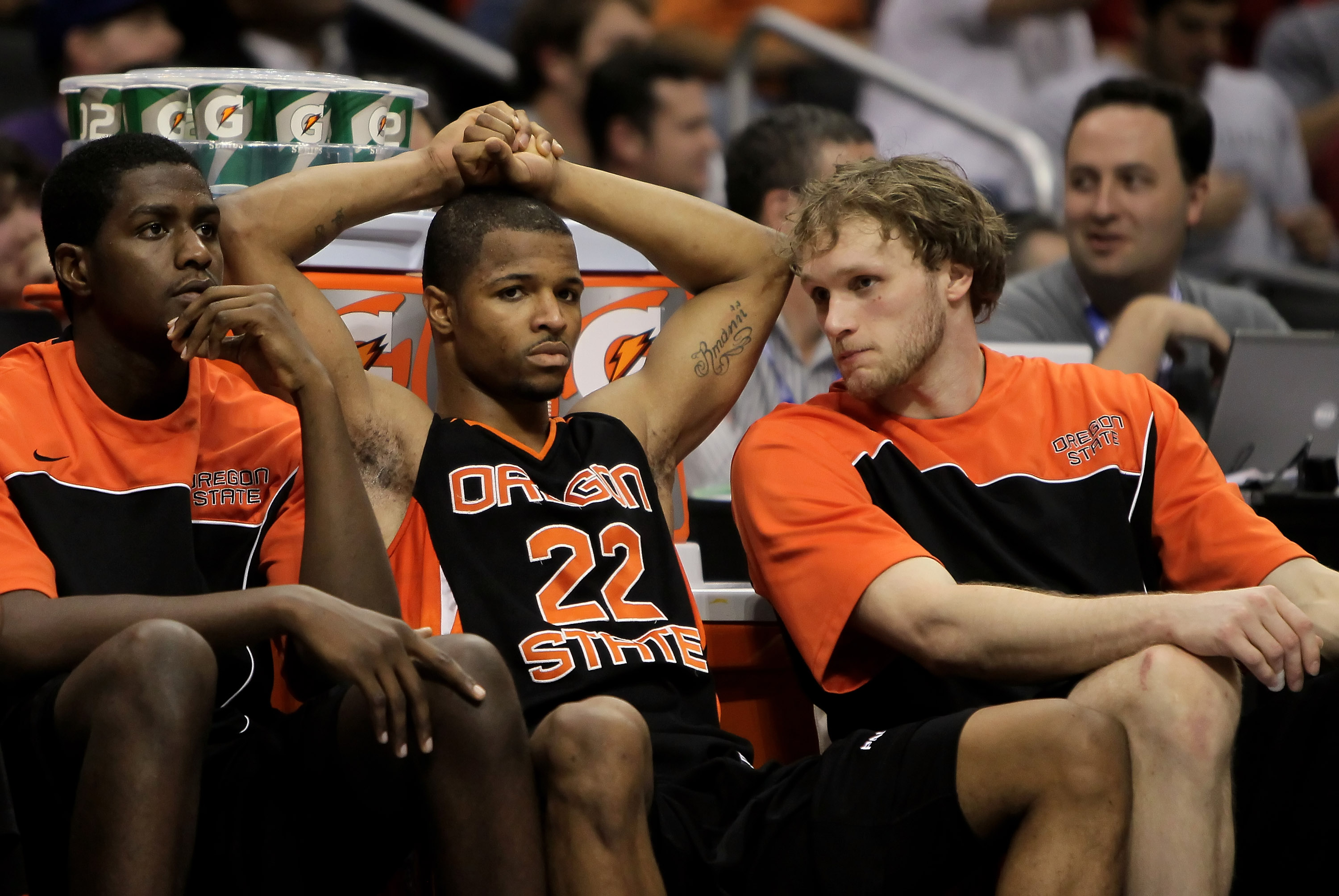 LOS ANGELES, CA - MARCH 11: Calvin Haynes (center) #22 of the Oregon State Beavers is dejected against the Washington Huskies during the Quarterfinals of the Pac-10 Basketball Tournament at Staples Center on March 11, 2010 in Los Angeles, California. Was