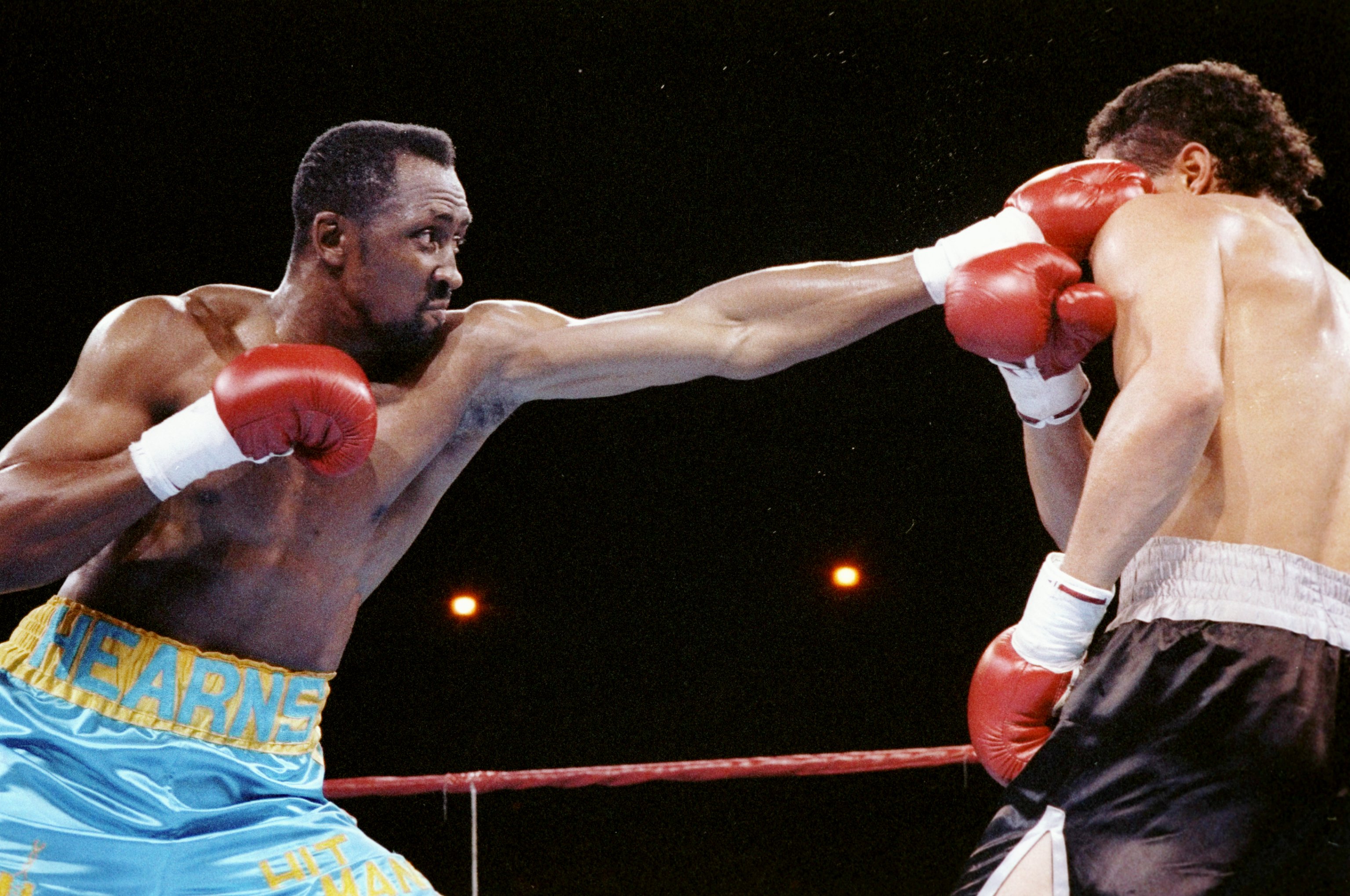 3 Jun 1991:  Thomas Hearns (left) lands a punch to the face of his opponent Virgil Hill. Mandatory Credit: Holly Stein  /Allsport