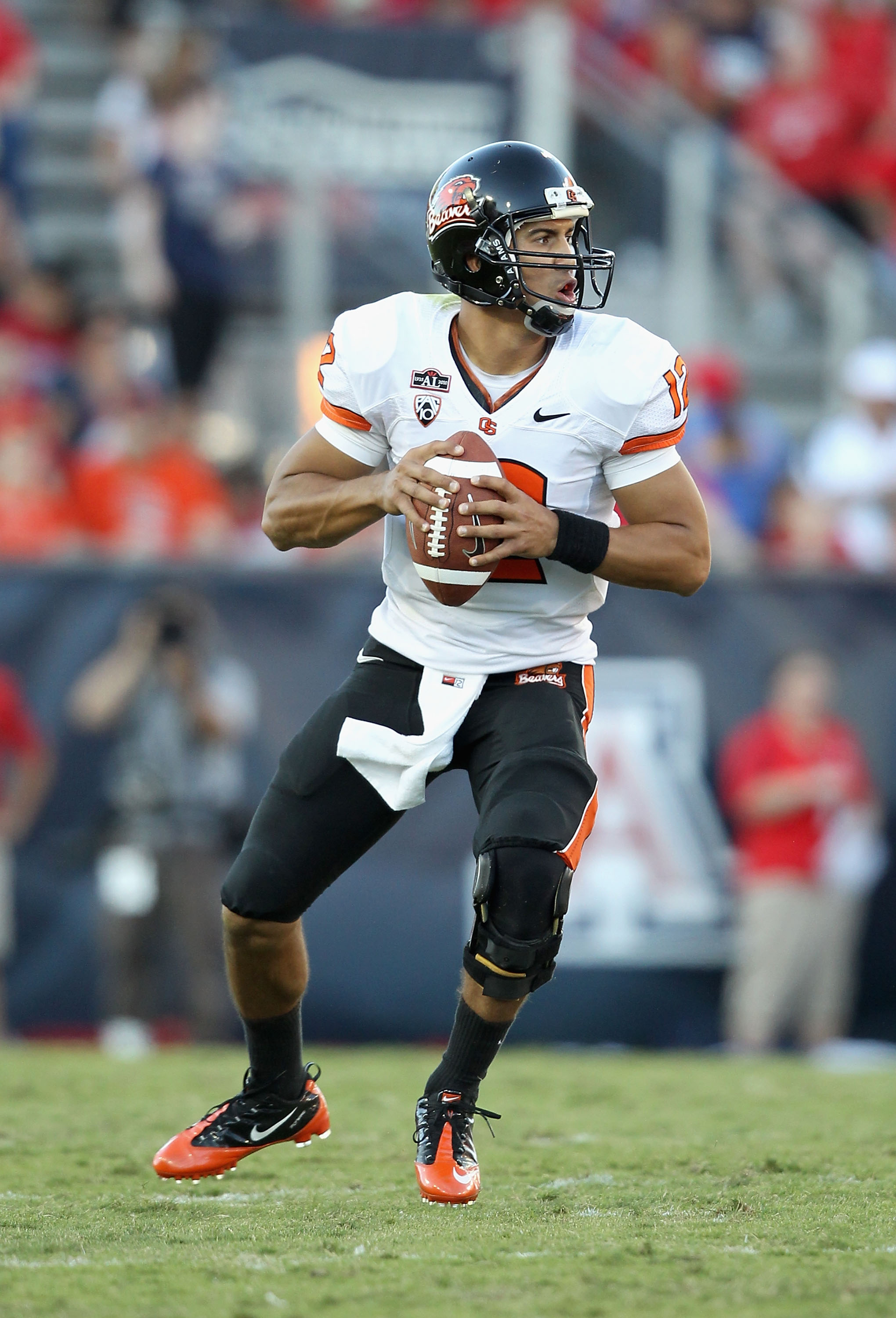 TUCSON, AZ - OCTOBER 09: Quarterback Ryan Katz #12 of the Oregon State Beavers drops back to pass during the college football game against the Arizona Wildcats at Arizona Stadium on October 9, 2010 in Tucson, Arizona. The Beavers defeated the Wildcats 2