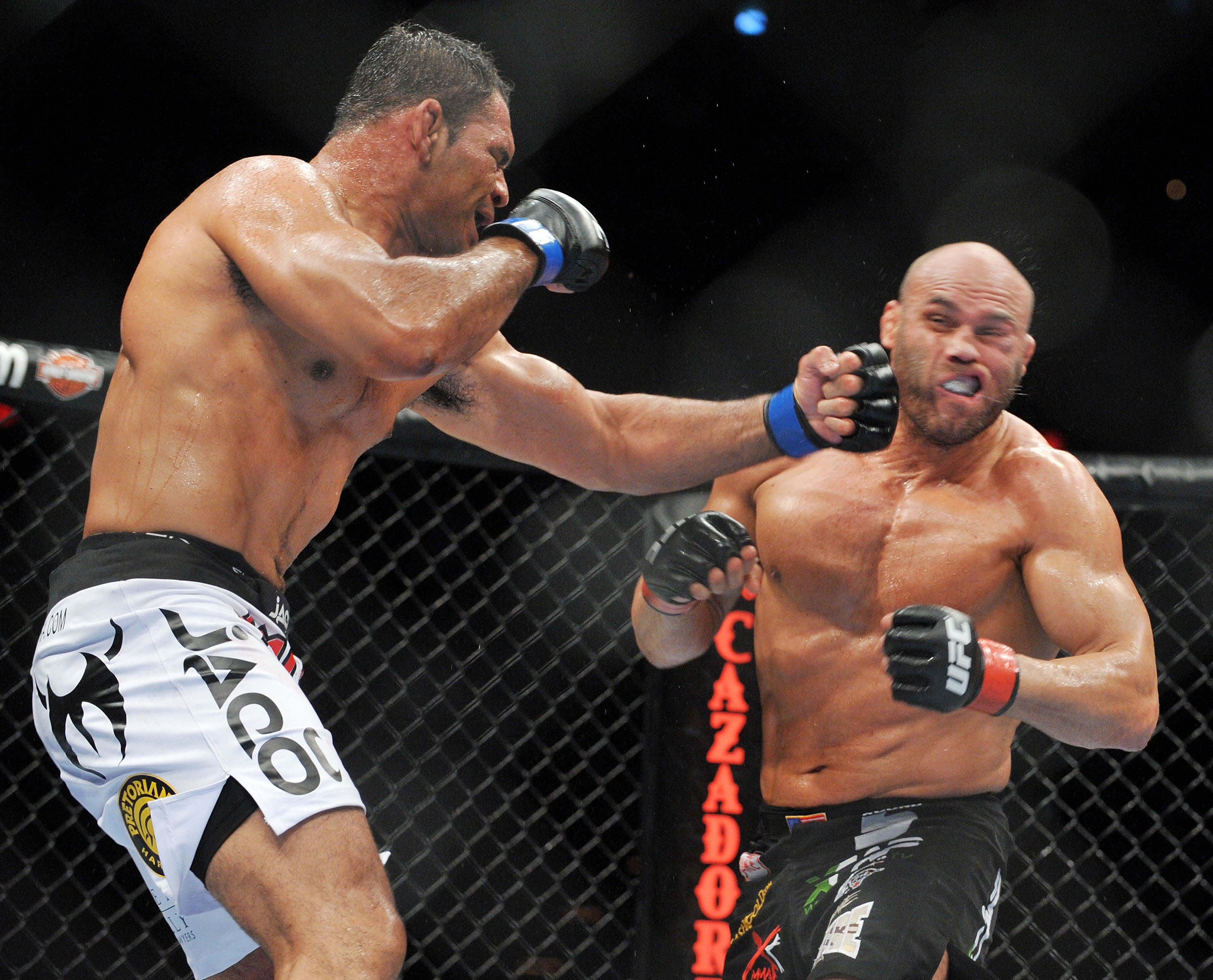 PORTLAND, OR - AUGUST 29: UFC fighter Antonio Nogueira (L) battles UFC fighter Randy Couture (R) during their Heavyweight bout at UFC 102: Couture vs. Nogueira at the Rose Garden Arena on August 29, 2009 in Portland, Oregon. (Photo by Jon Kopaloff/Gett