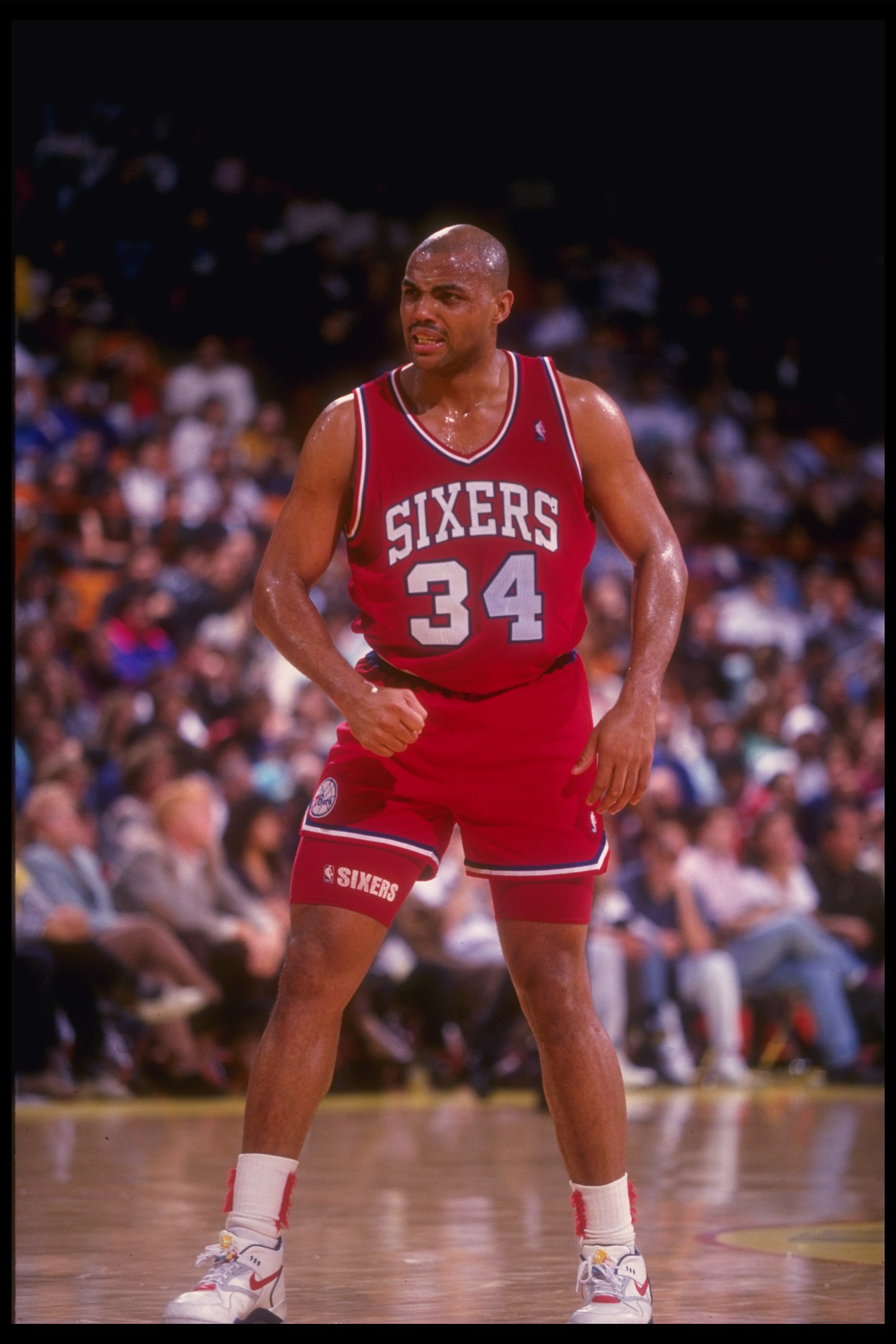 30 Dec 1990: Forward Charles Barkley of the Philadelphia 76ers looks on during a game against the Los Angeles Lakers at the CoreStates Spectrum in Inglewood, California. The Lakers won the game, 115-107.