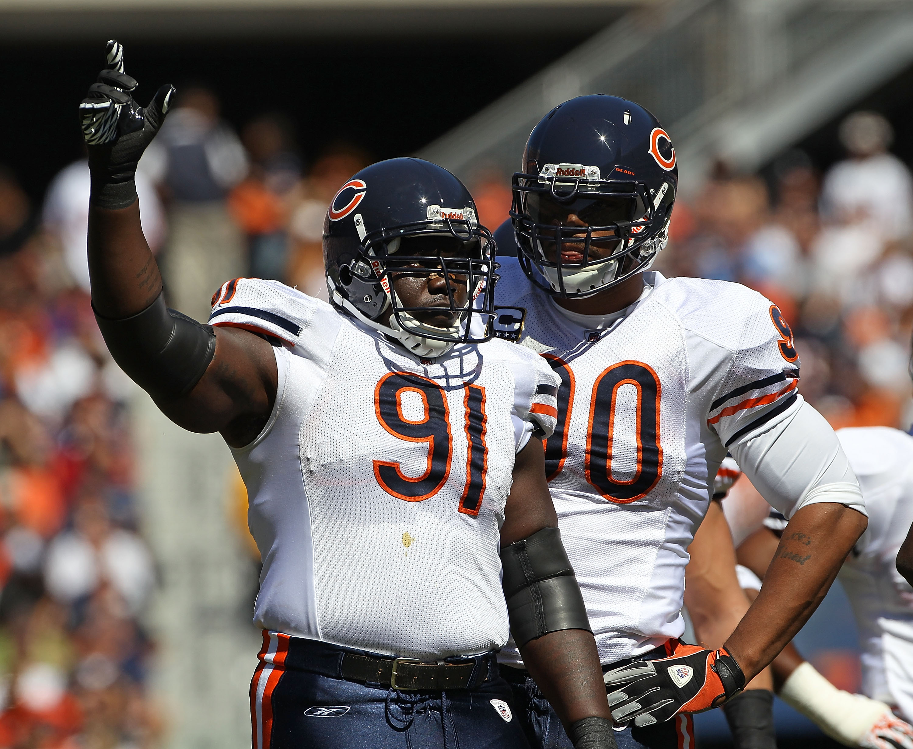 Chicago Bears defensive end Julius Peppers (90) stands on the sidelines  late in the fourth quarter against the Dallas Cowboys at Soldier Field in  Chicago on December 9, 2013. The Bears defeated