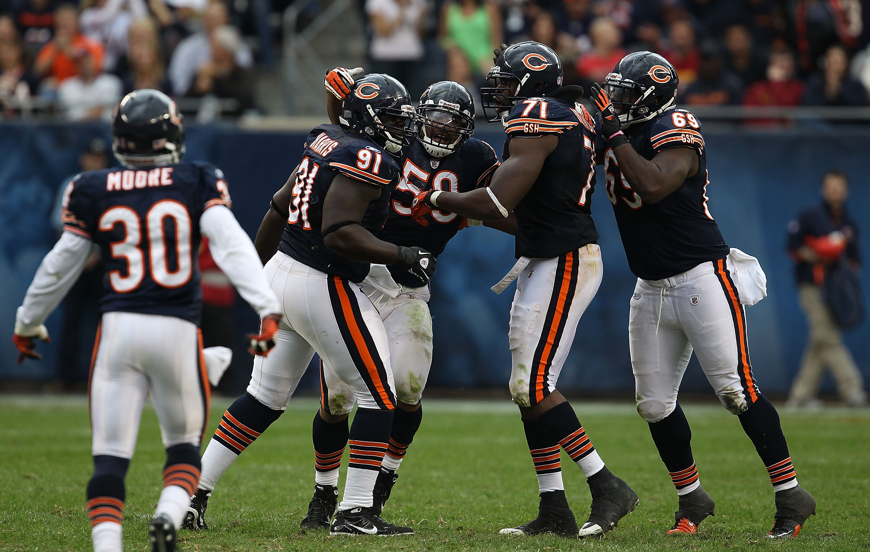 Chicago Bears defensive tackle Henry Melton (69) leaves the game