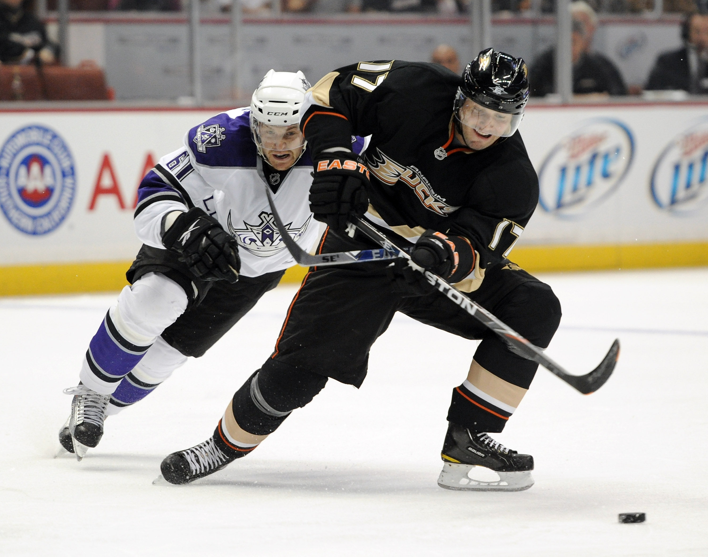 ANAHEIM, CA - OCTOBER 03:  Lubomir Visnovsky #17 of the Anaheim Ducks is chased by Trevor Lewis #61 of the Los Angeles Kings at Honda Center on October 3, 2010 in Anaheim, California.  (Photo by Harry How/Getty Images)