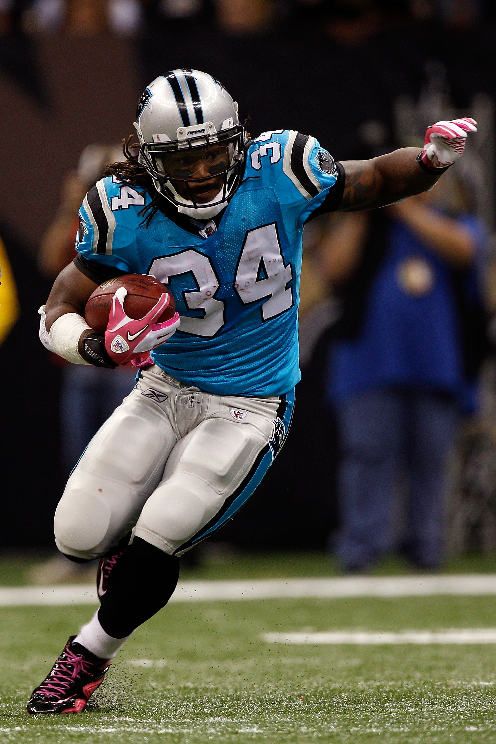 NEW ORLEANS - OCTOBER 03:  DeAngelo Williams #34 of the Carolina Panthers in action during the game against the New Orleans Saints at the Louisiana Superdome on October 3, 2010 in New Orleans, Louisiana.  (Photo by Chris Graythen/Getty Images)