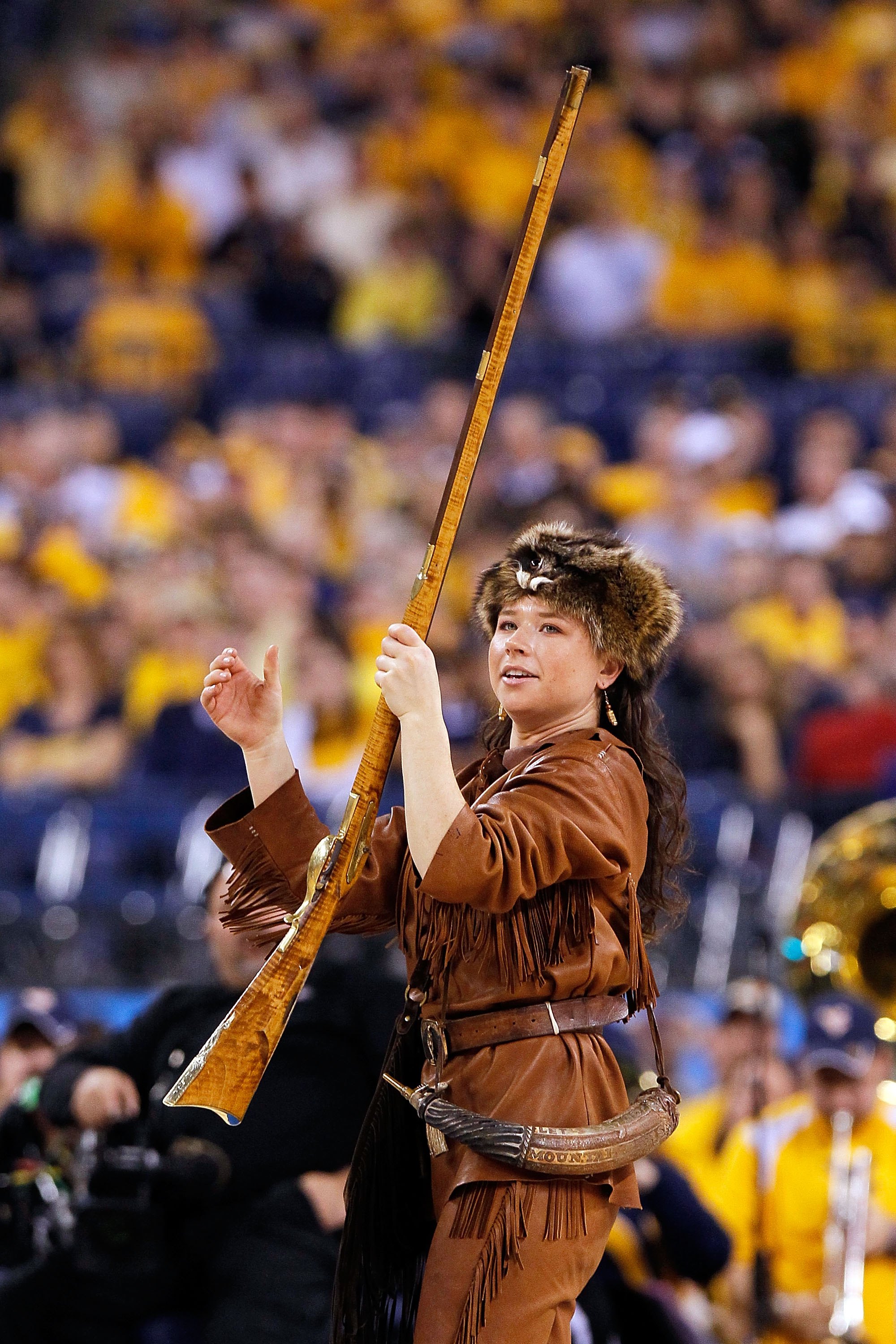 INDIANAPOLIS - APRIL 03:  Rebecca Durst, mascot for of the West Virginia Mountaineers performs during a break in the game while taking on the Duke Blue Devils during the National Semifinal game of the 2010 NCAA Division I Men's Basketball Championship at