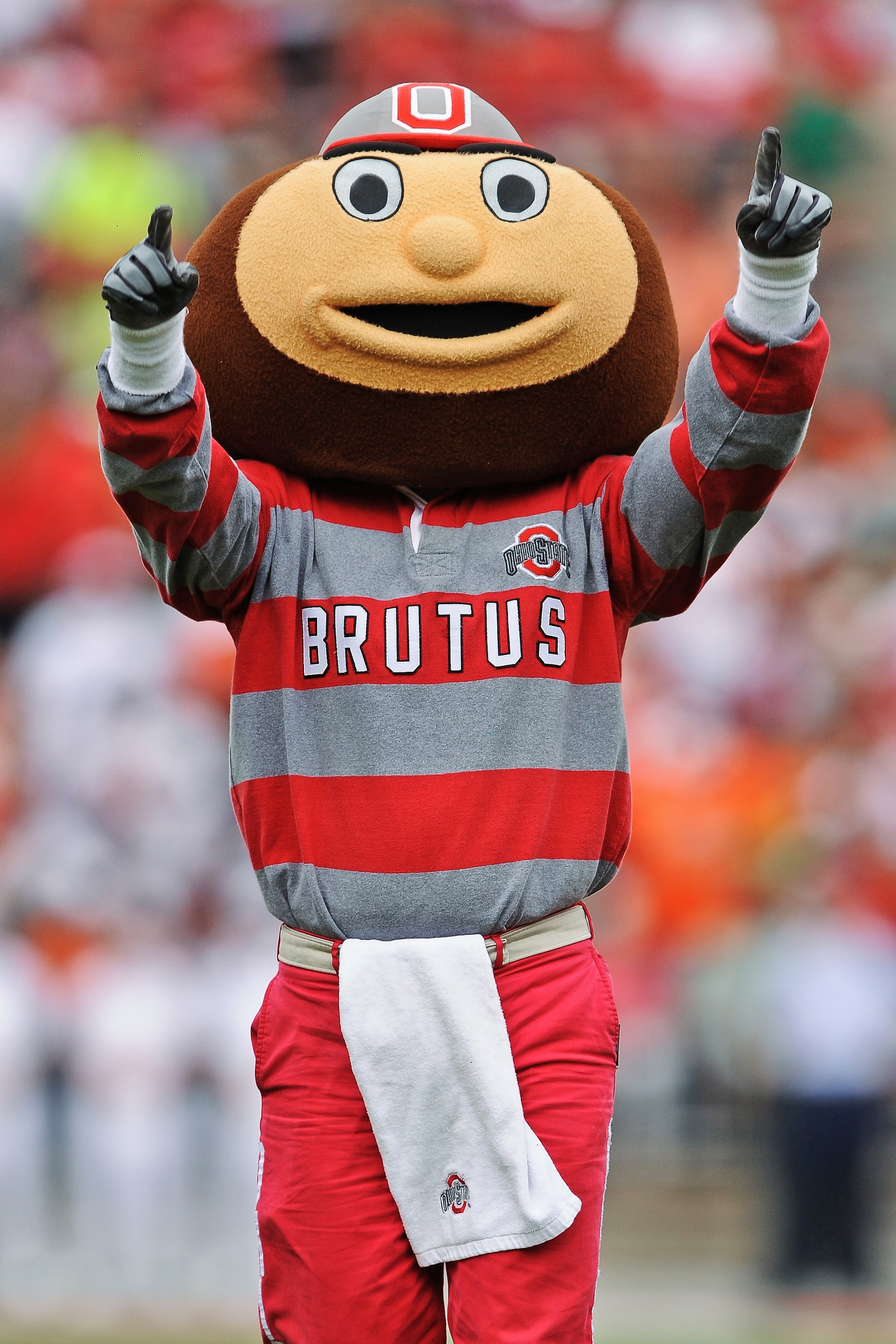 COLUMBUS, OH - SEPTEMBER 11:  Mascot Brutus Buckeye fires up the crowd before a game against the Miami Hurricanes at Ohio Stadium on September 11, 2010 in Columbus, Ohio.  (Photo by Jamie Sabau/Getty Images)
